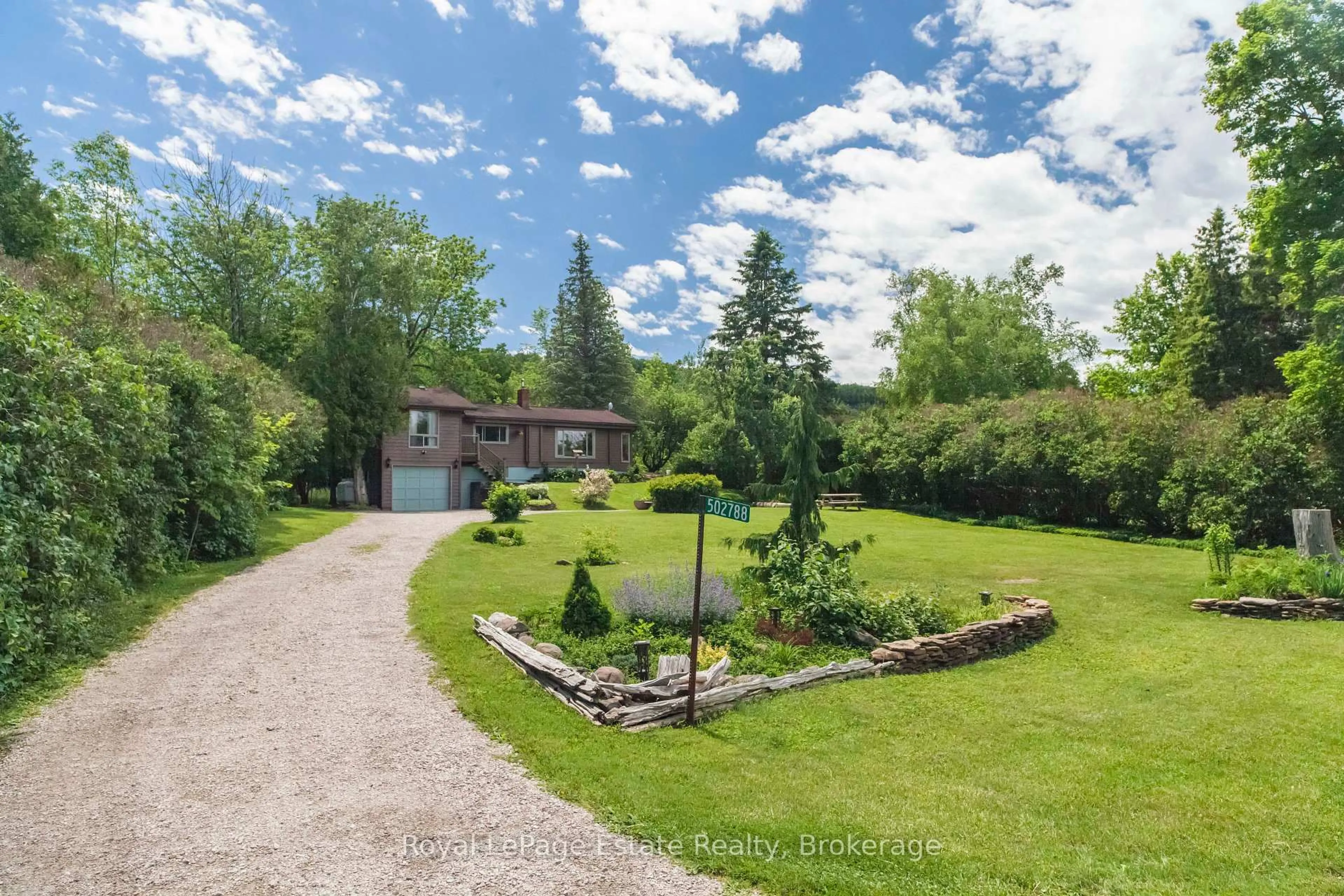 A pic from outside/outdoor area/front of a property/back of a property/a pic from drone, unknown for 502788 Grey Road 1, Georgian Bluffs Ontario N0H 2T0