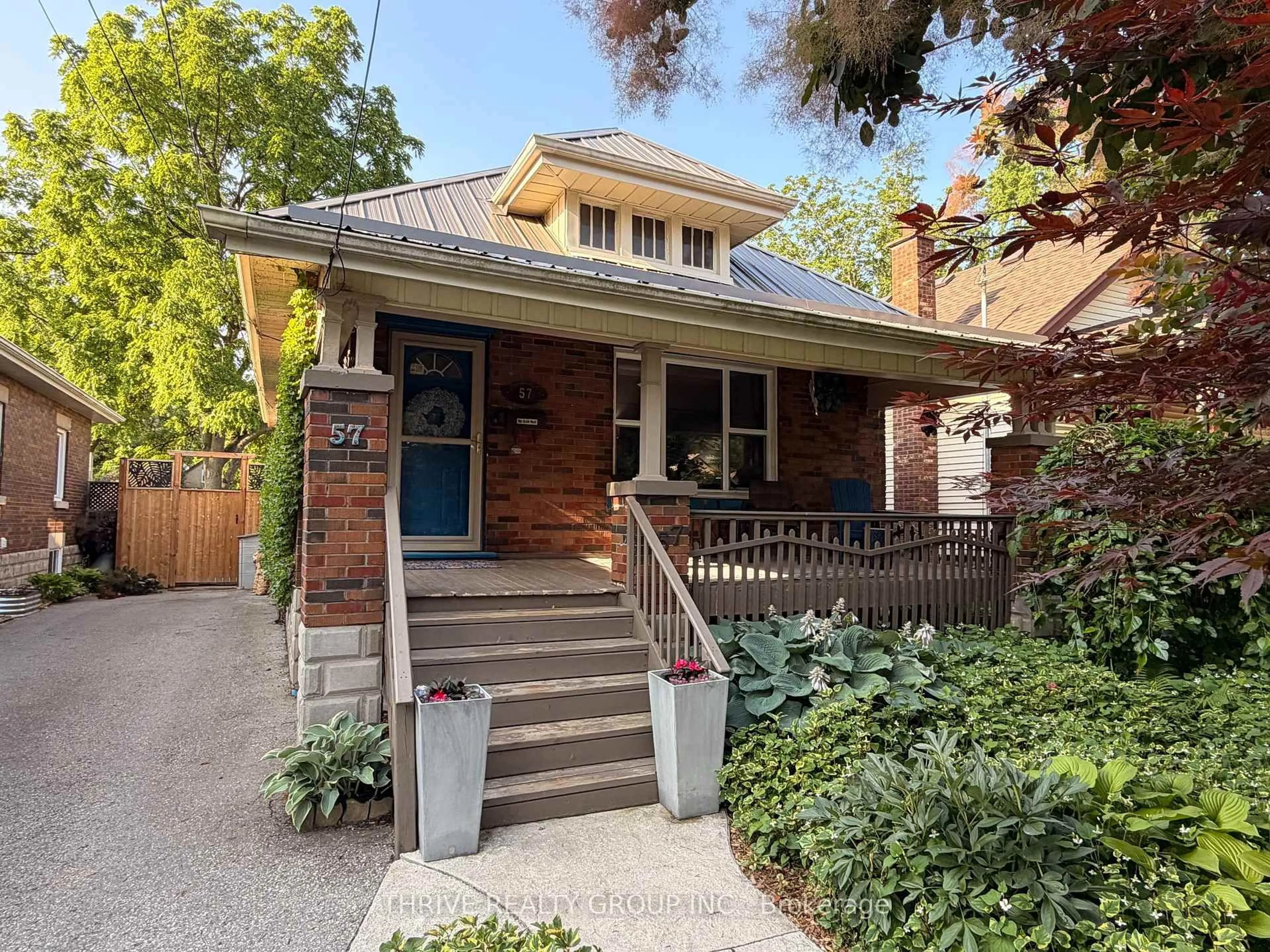 Home with brick exterior material, street for 57 Langarth St, London South Ontario N6C 1Y9