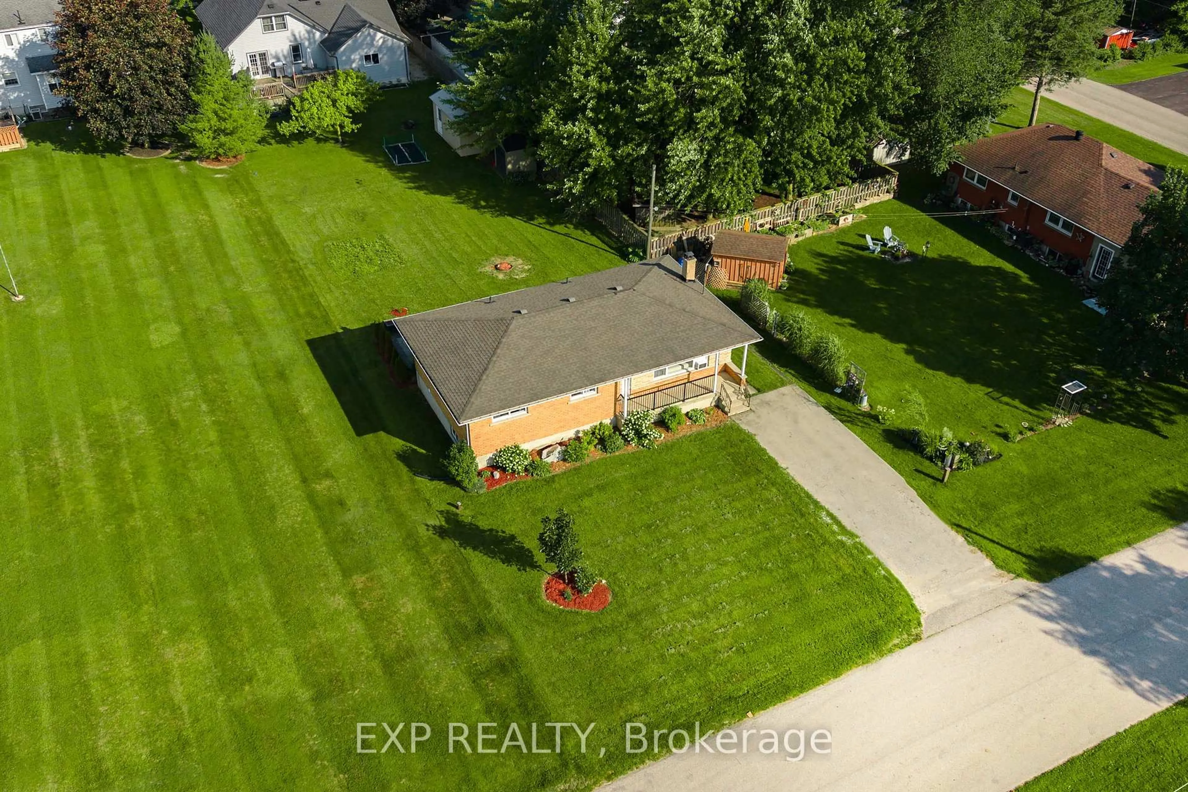 A pic from outside/outdoor area/front of a property/back of a property/a pic from drone, street for 261 King St, North Perth Ontario N0G 1B0