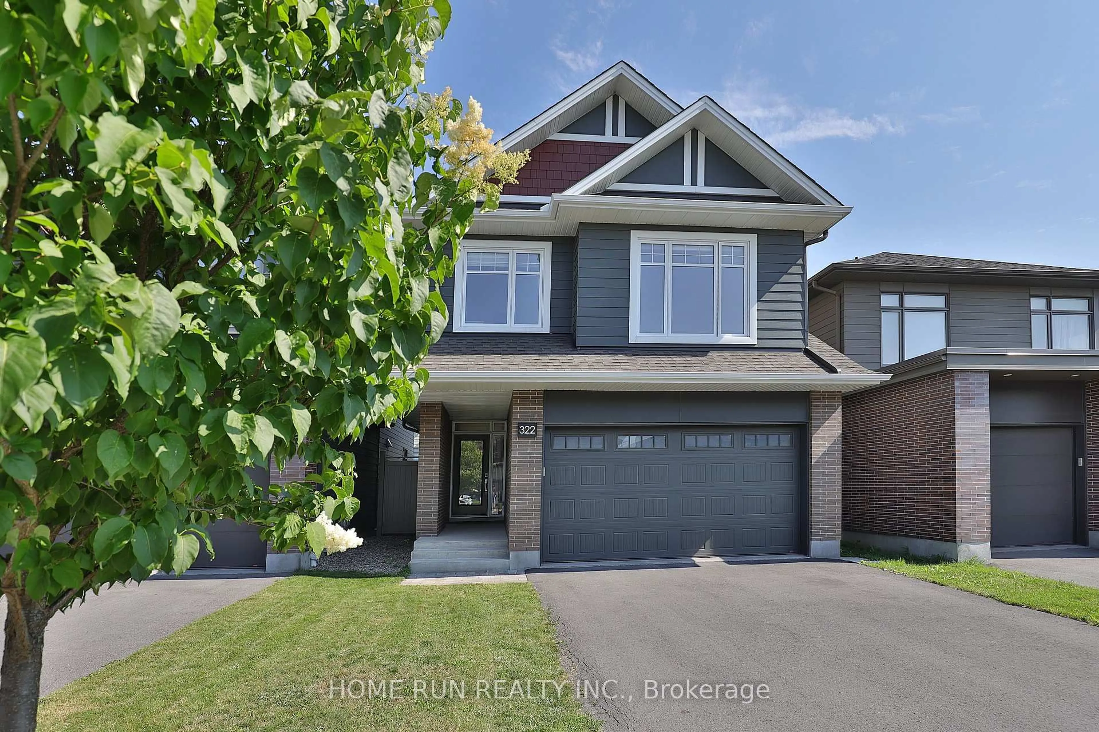 Home with brick exterior material, street for 322 Lysander Pl, Ottawa Ontario K1K 4K7