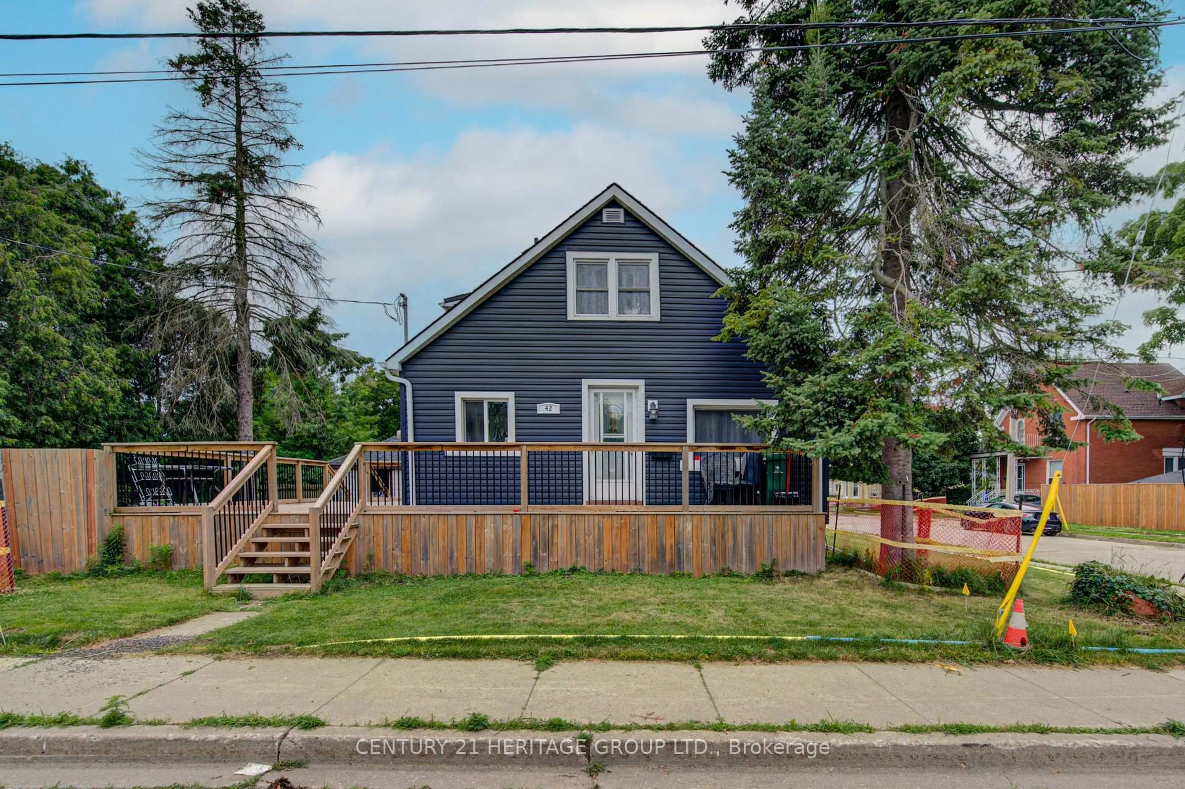 Home with vinyl exterior material, street for 42 Henry St, Cambridge Ontario N1R 3W4