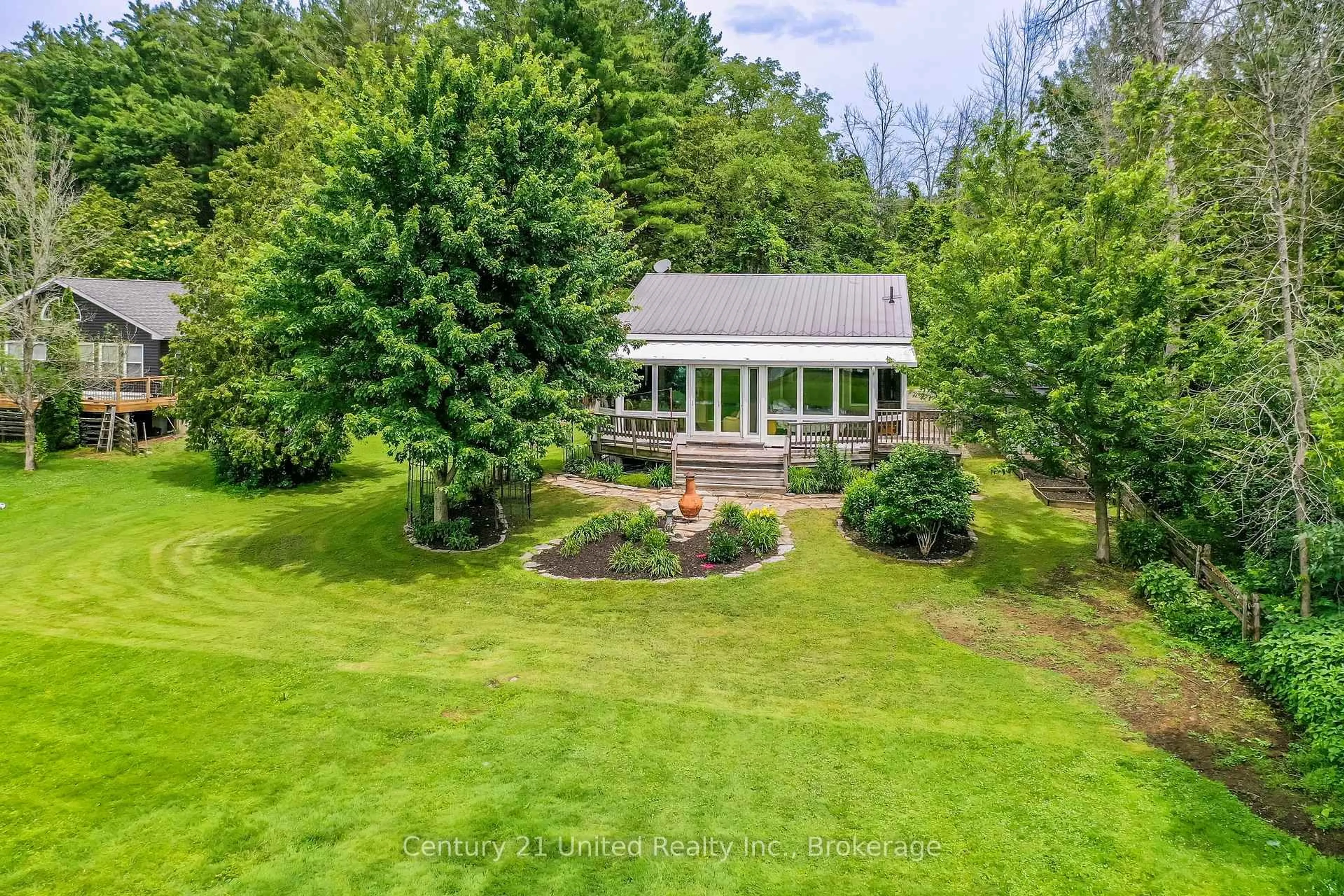 A pic from outside/outdoor area/front of a property/back of a property/a pic from drone, water/lake/river/ocean view for 336 Cedar Bank Rd, Otonabee-South Monaghan Ontario K9J 6Y3