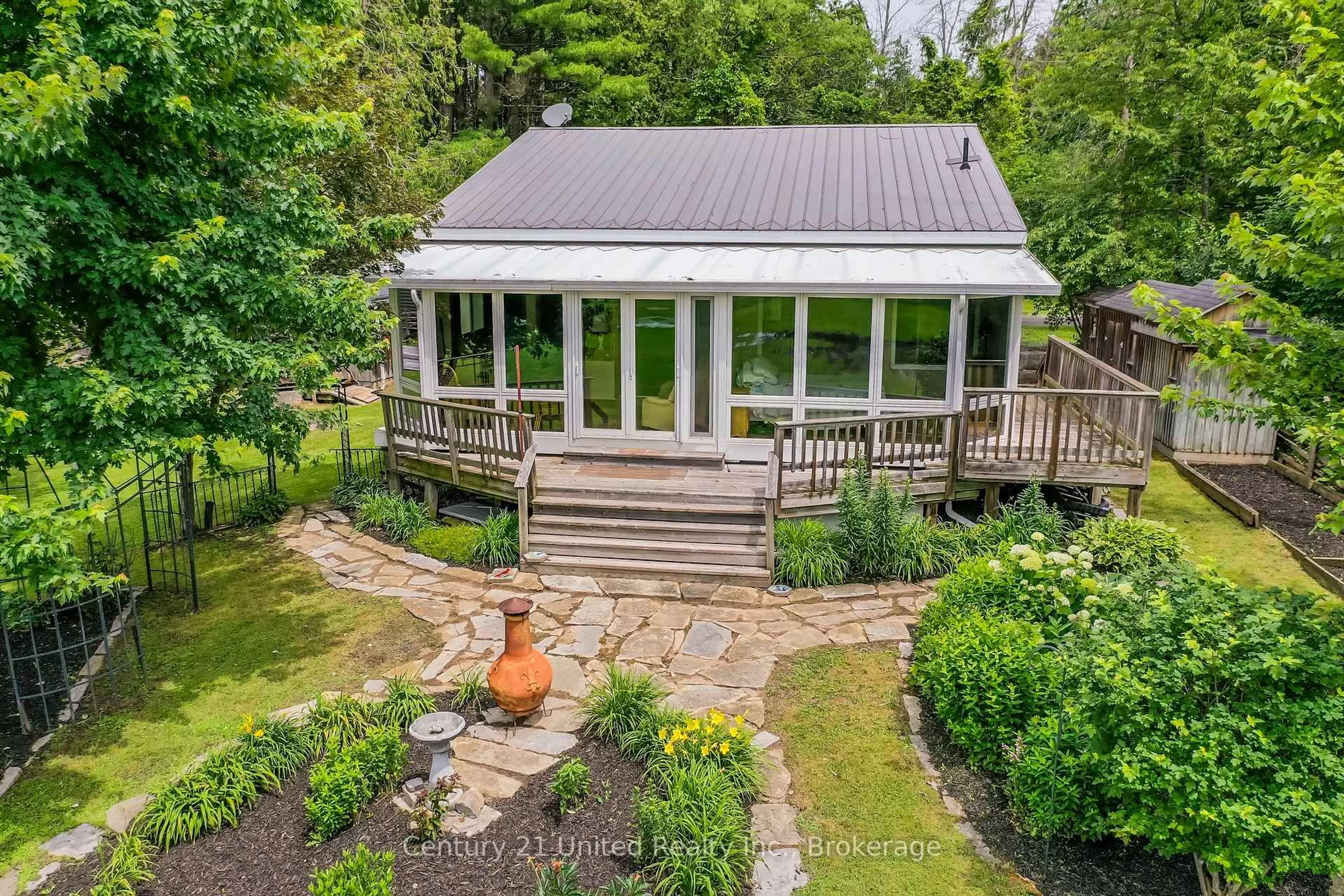 A pic from outside/outdoor area/front of a property/back of a property/a pic from drone, water/lake/river/ocean view for 336 Cedar Bank Rd, Otonabee-South Monaghan Ontario K9J 6Y3