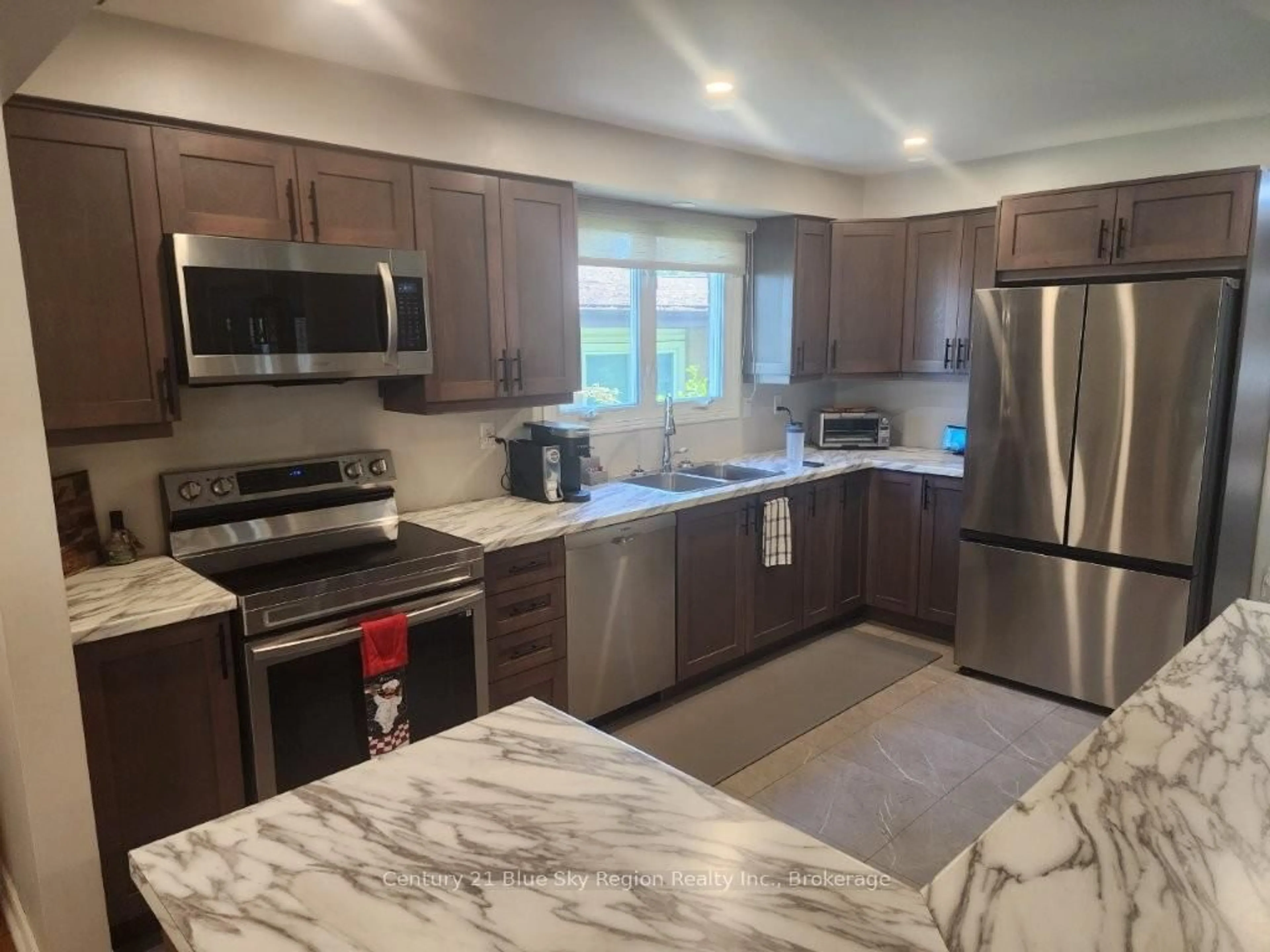 Open concept kitchen, ceramic/tile floor for 14 Birch St, North Bay Ontario P1A 1R8