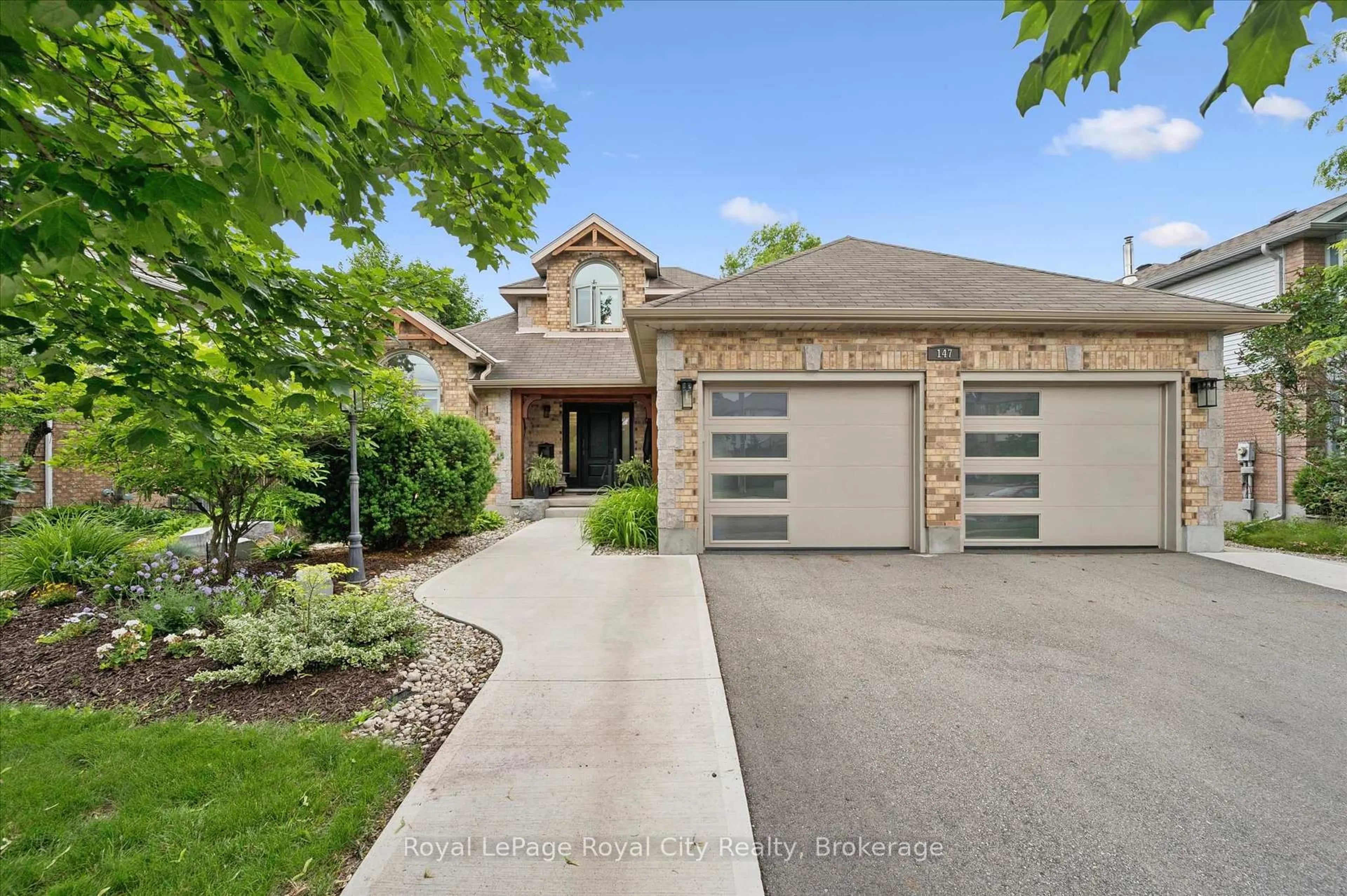 Home with brick exterior material, street for 147 Downey Rd, Guelph Ontario N1C 1A3