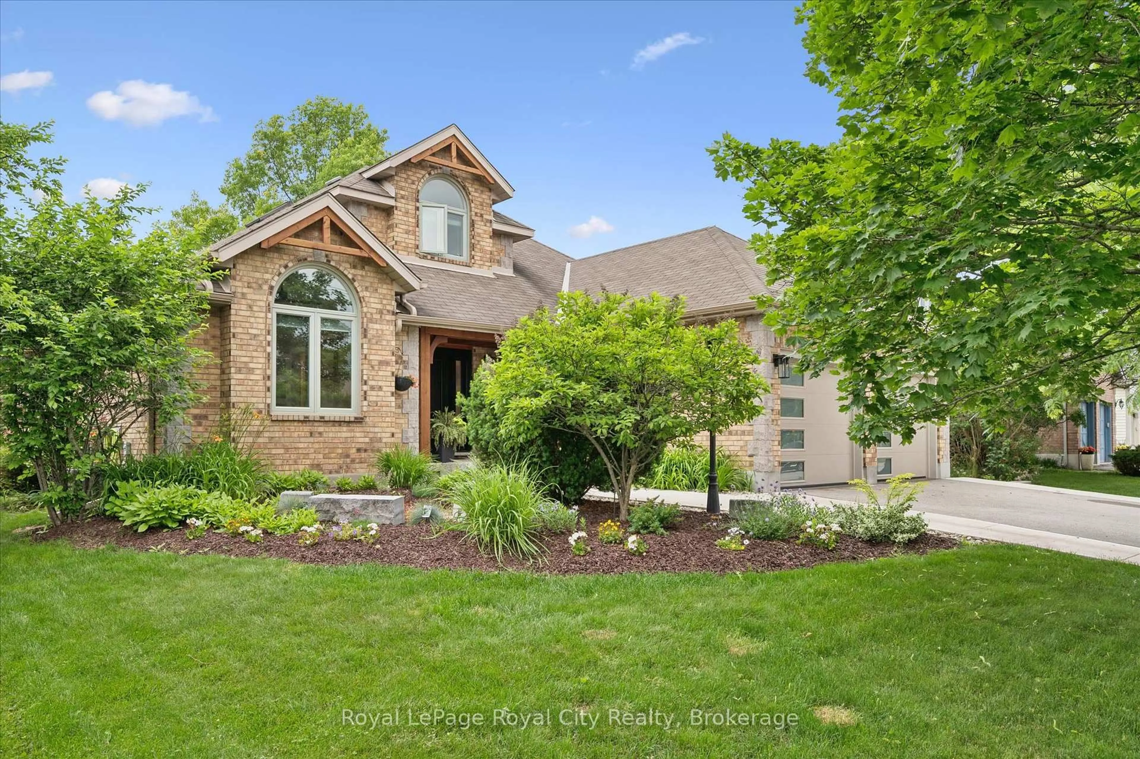 Home with brick exterior material, street for 147 Downey Rd, Guelph Ontario N1C 1A3