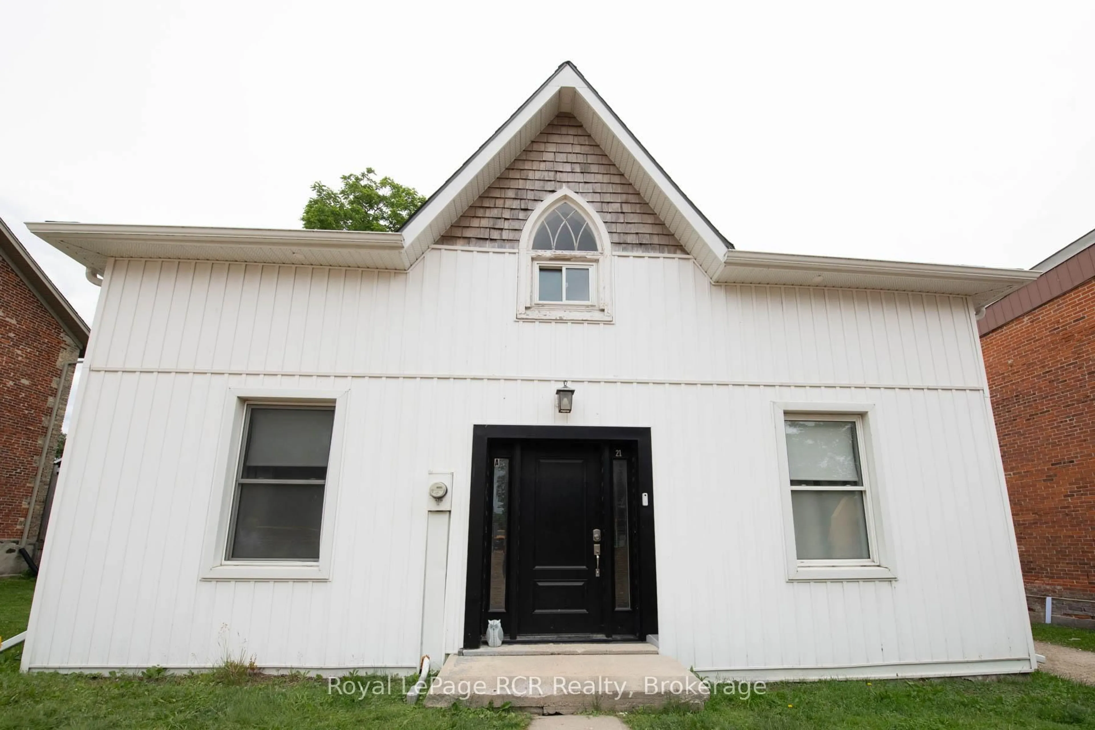 Home with vinyl exterior material, street for 21 ARTHUR STREET WEST St #A & B & C, Minto Ontario N0G 1Z0