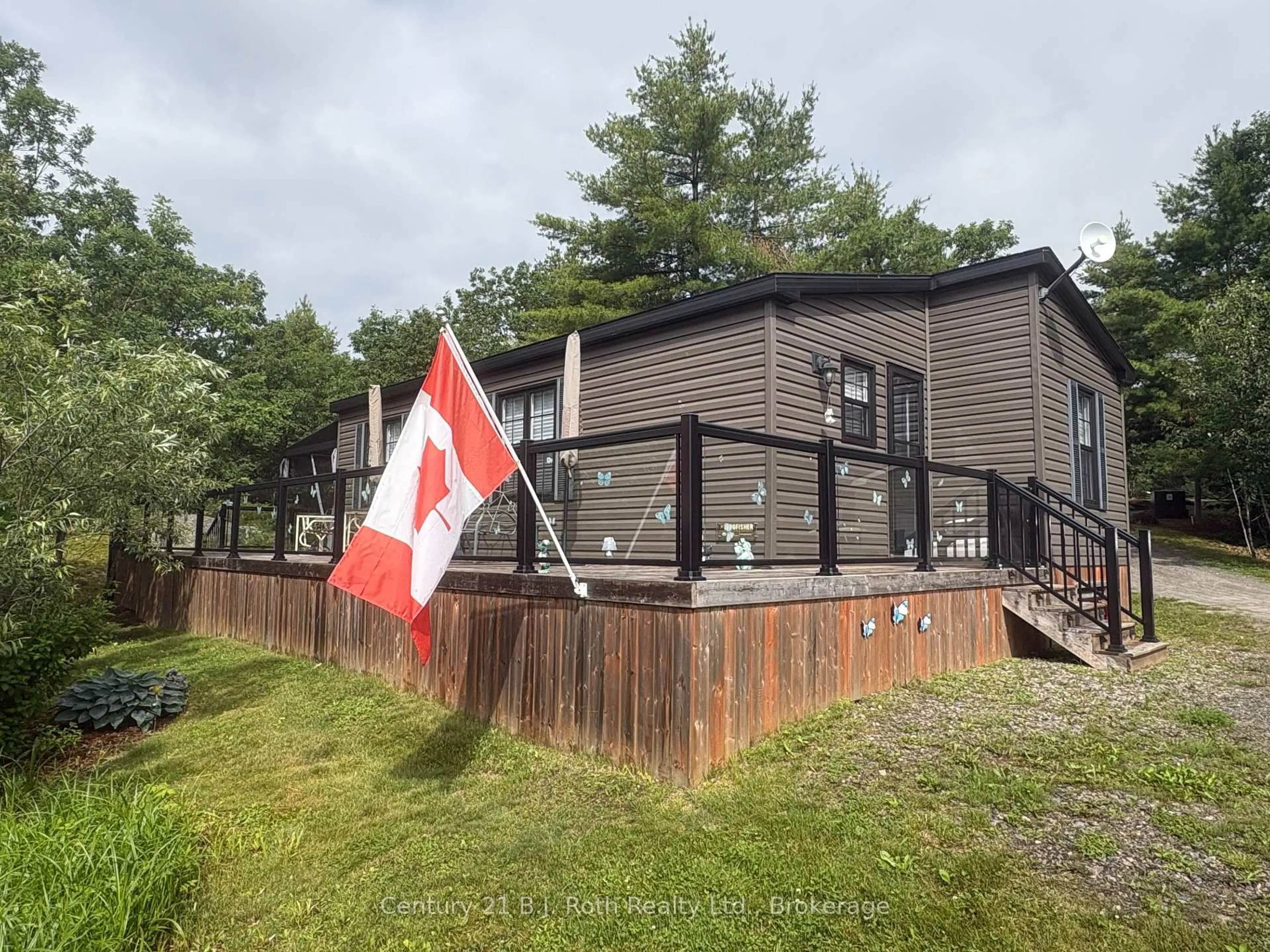 A pic from outside/outdoor area/front of a property/back of a property/a pic from drone, unknown for 1336 South Morrison Lake Rd #23 MPLRDG, Gravenhurst Ontario P0E 1G0