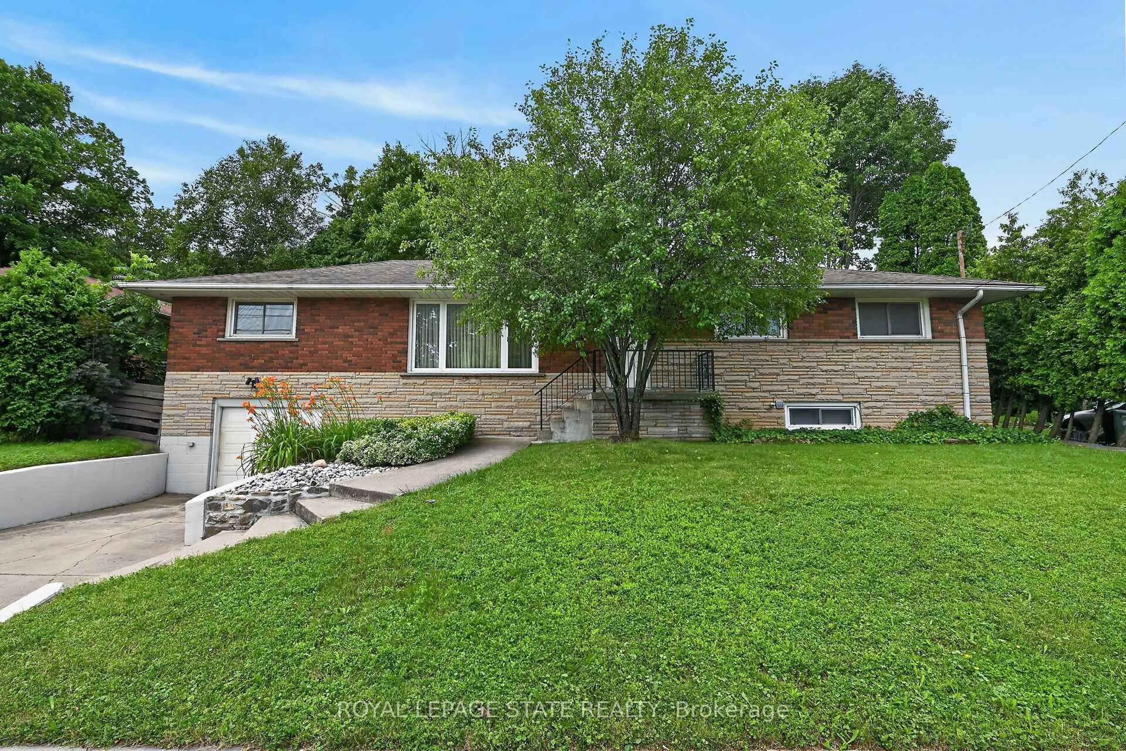 Home with brick exterior material, street for 27 Ainslie Ave, Hamilton Ontario L8S 2J5
