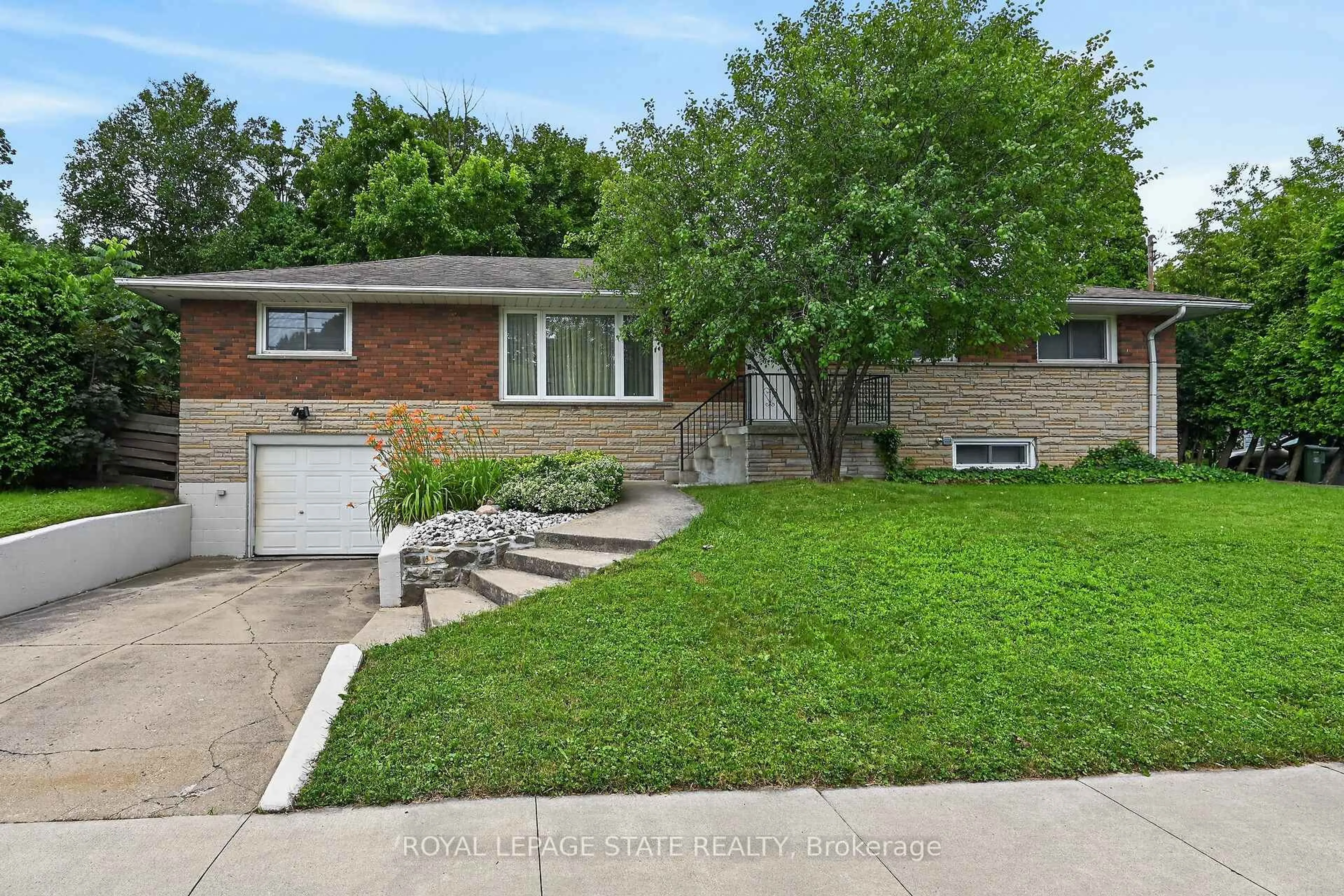 Home with brick exterior material, street for 27 Ainslie Ave, Hamilton Ontario L8S 2J5