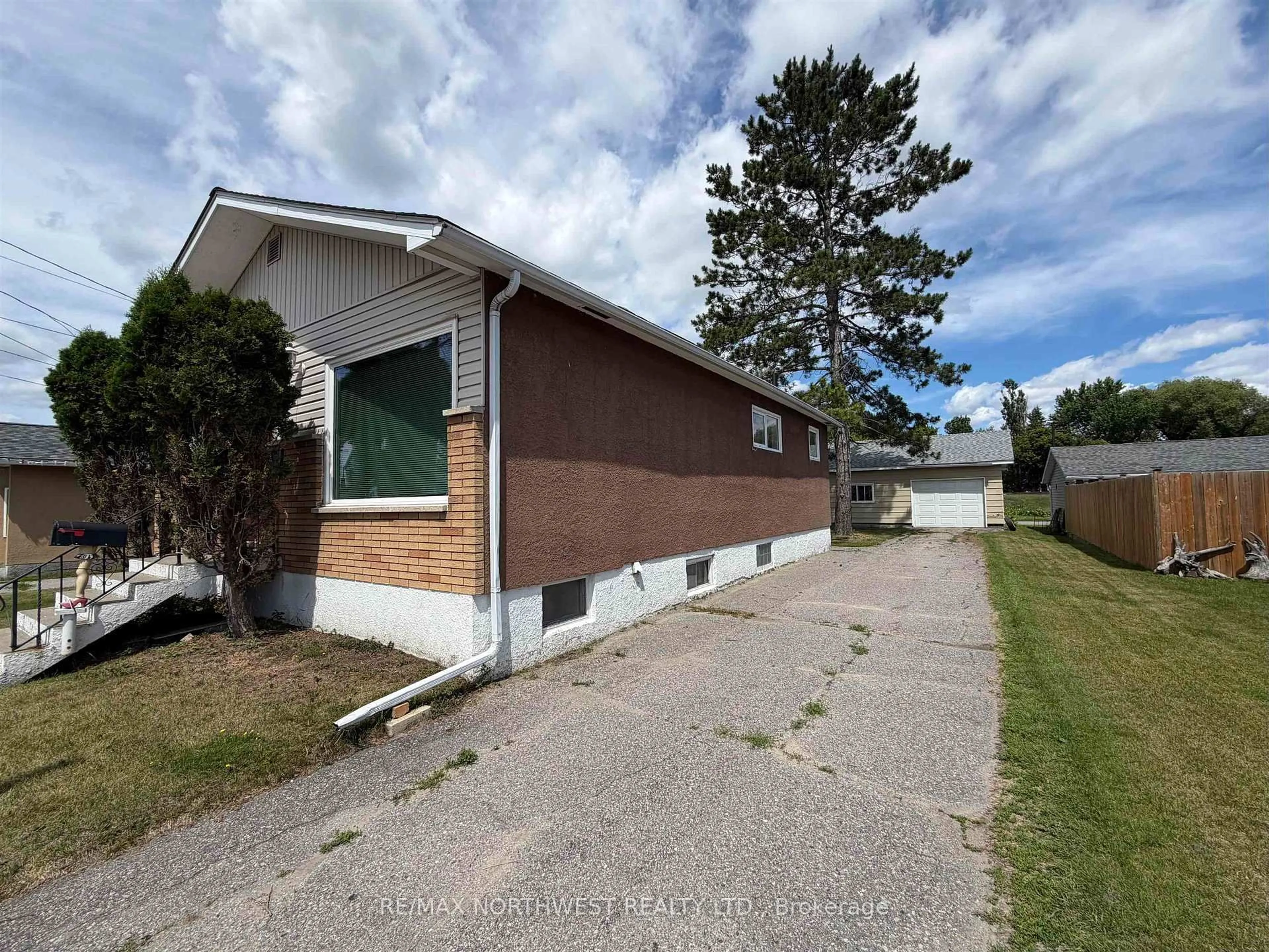 Home with vinyl exterior material, street for 238 Third St, Fort Frances Ontario P9A 1P8