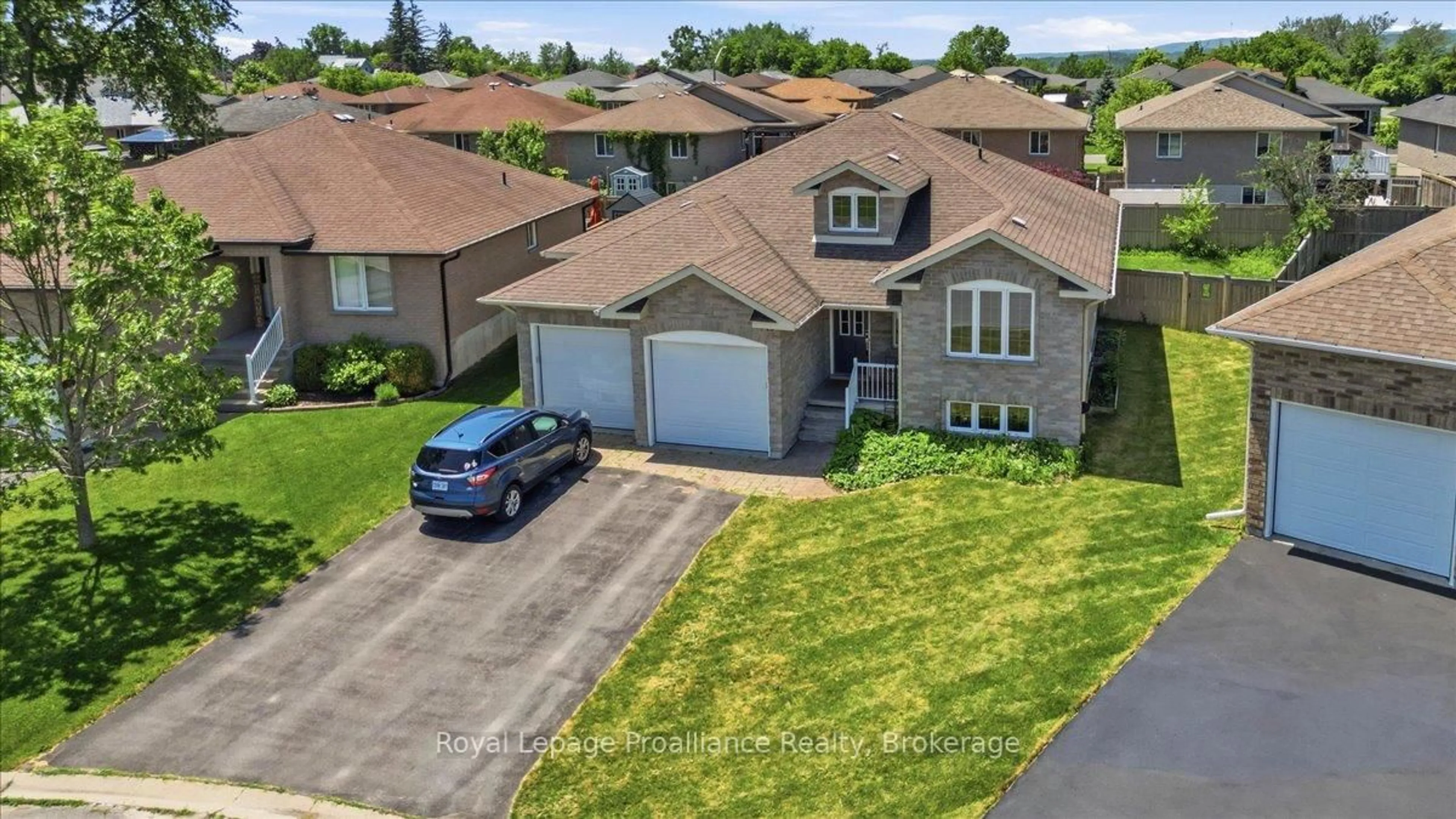 A pic from outside/outdoor area/front of a property/back of a property/a pic from drone, street for 13 Freedom Cres, Quinte West Ontario K8V 0C1