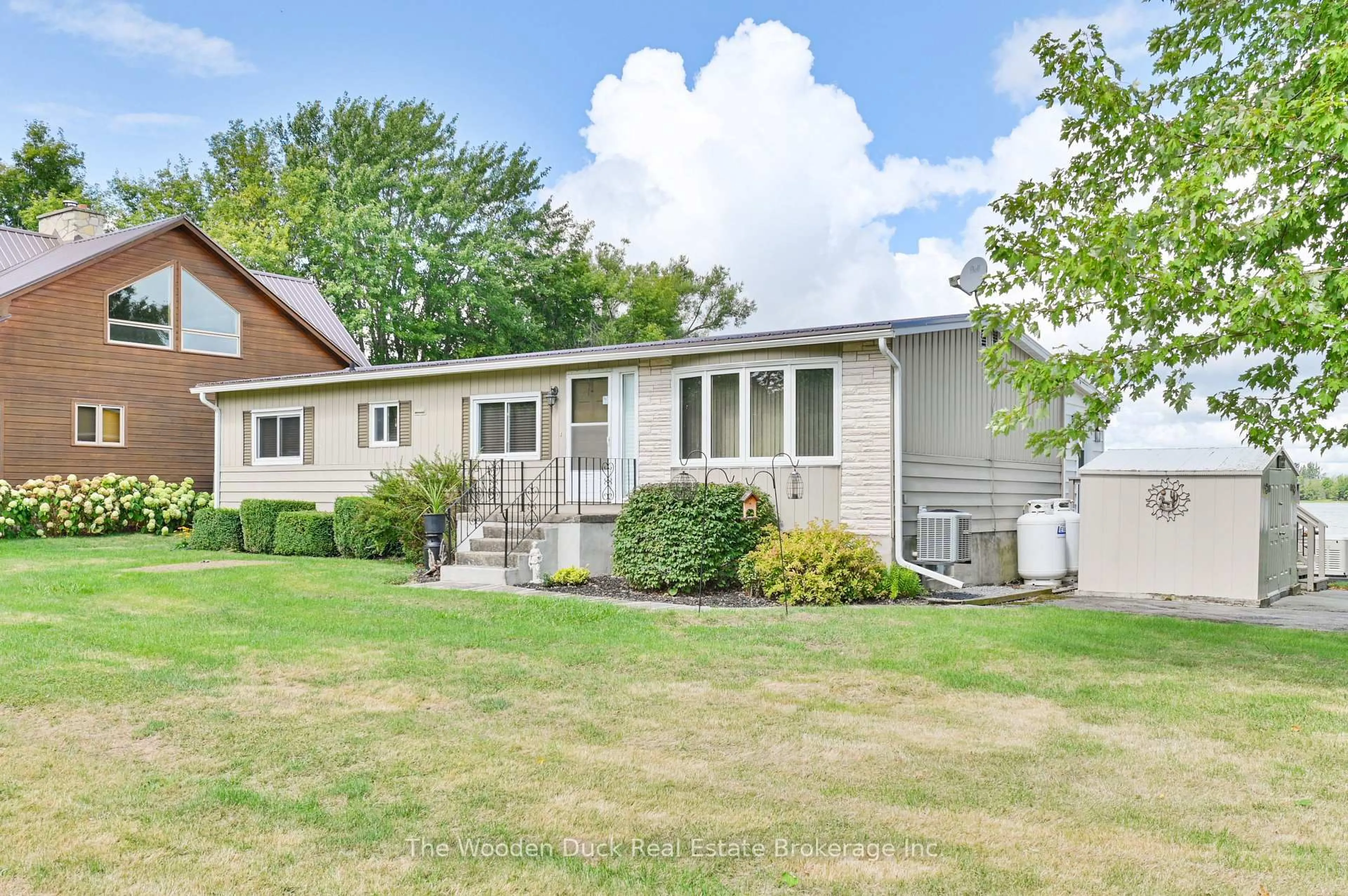 Home with vinyl exterior material, unknown for 1314 County RD 96 Rd, Wolfe Island Ontario K0H 2Y0
