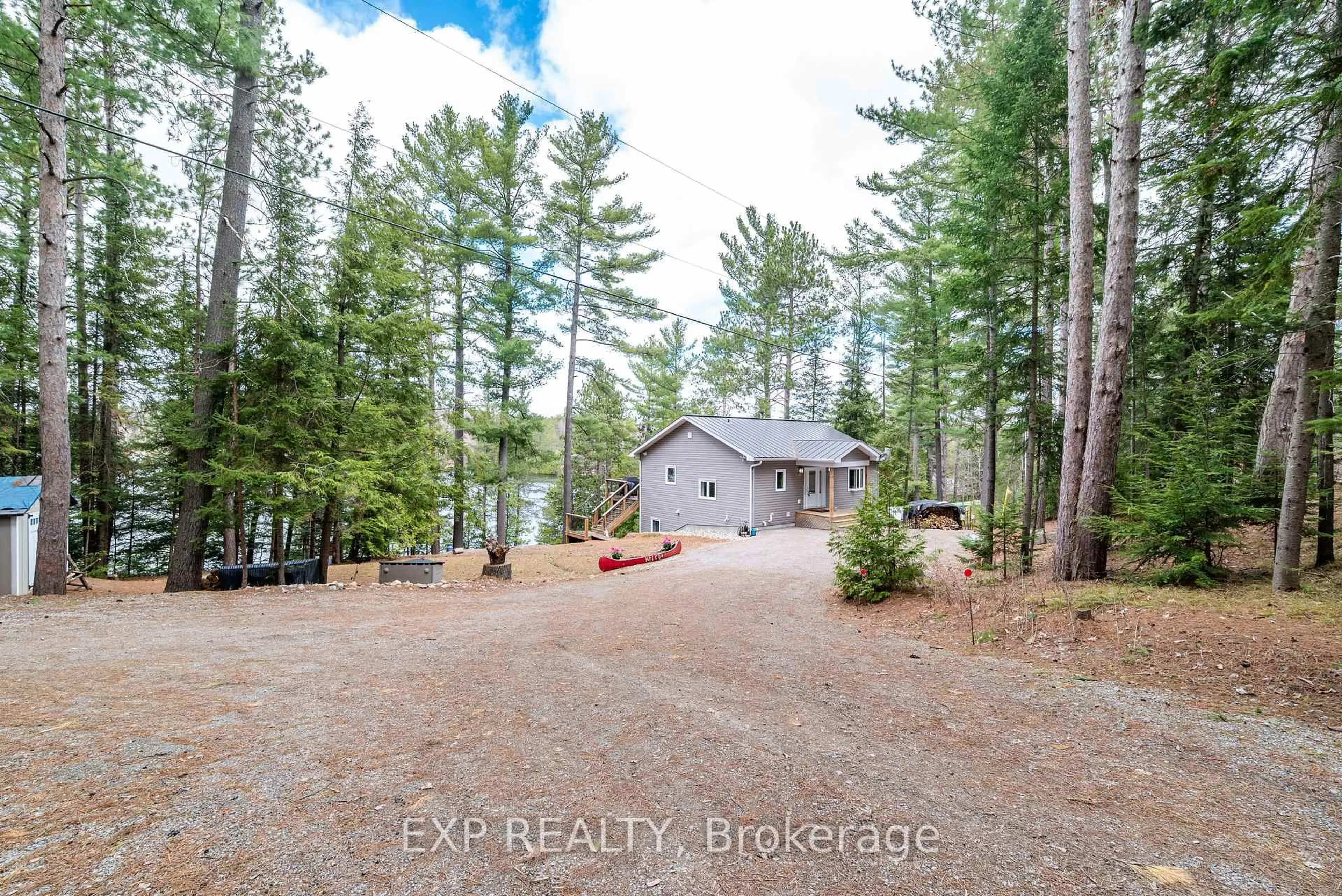 A pic from outside/outdoor area/front of a property/back of a property/a pic from drone, forest/trees view for 248 Roach Way, Haley Station Ontario K0J 1Y0
