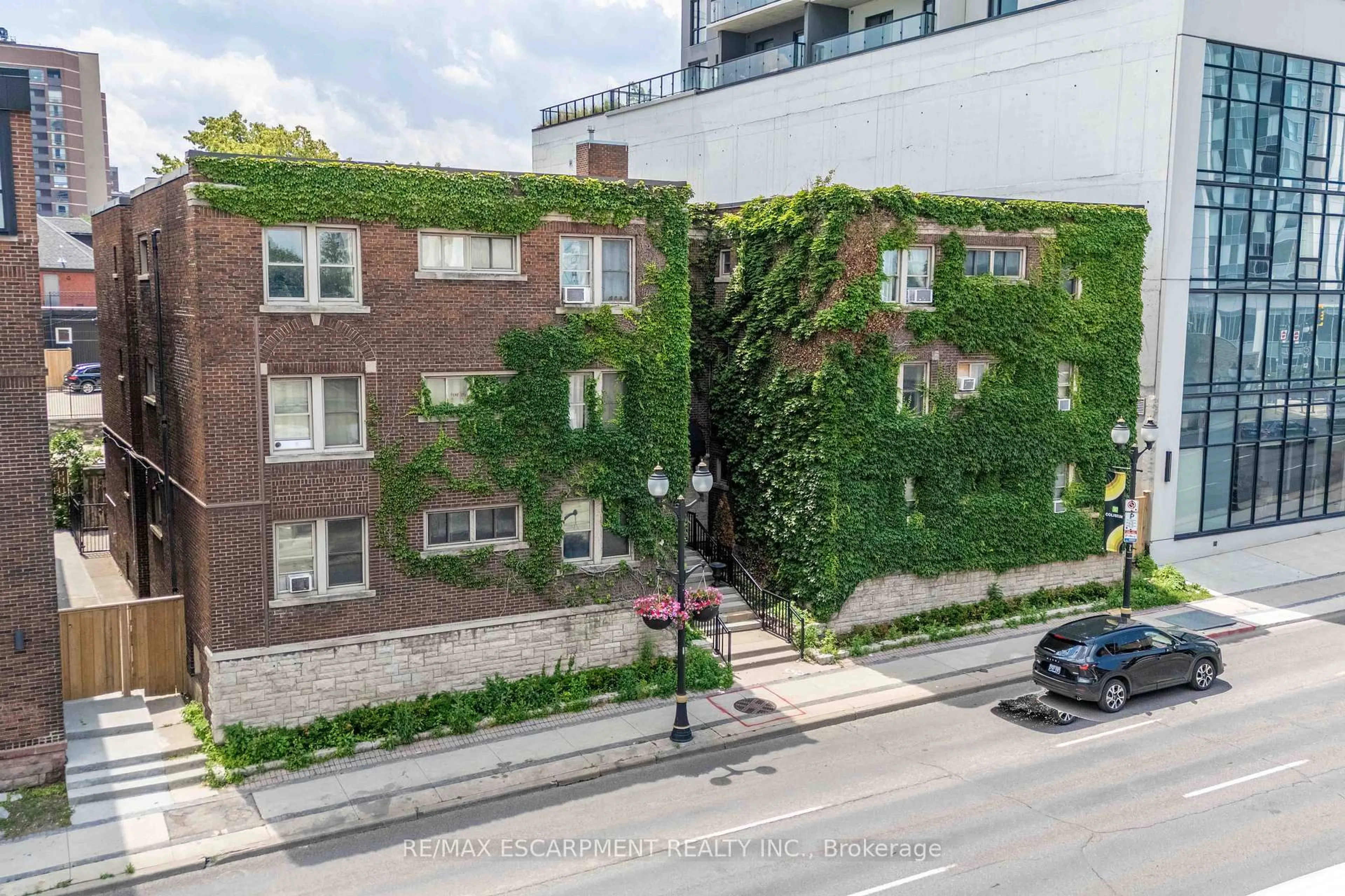 A pic from outside/outdoor area/front of a property/back of a property/a pic from drone, street for 285 King St #4, Hamilton Ontario L8P 1B2