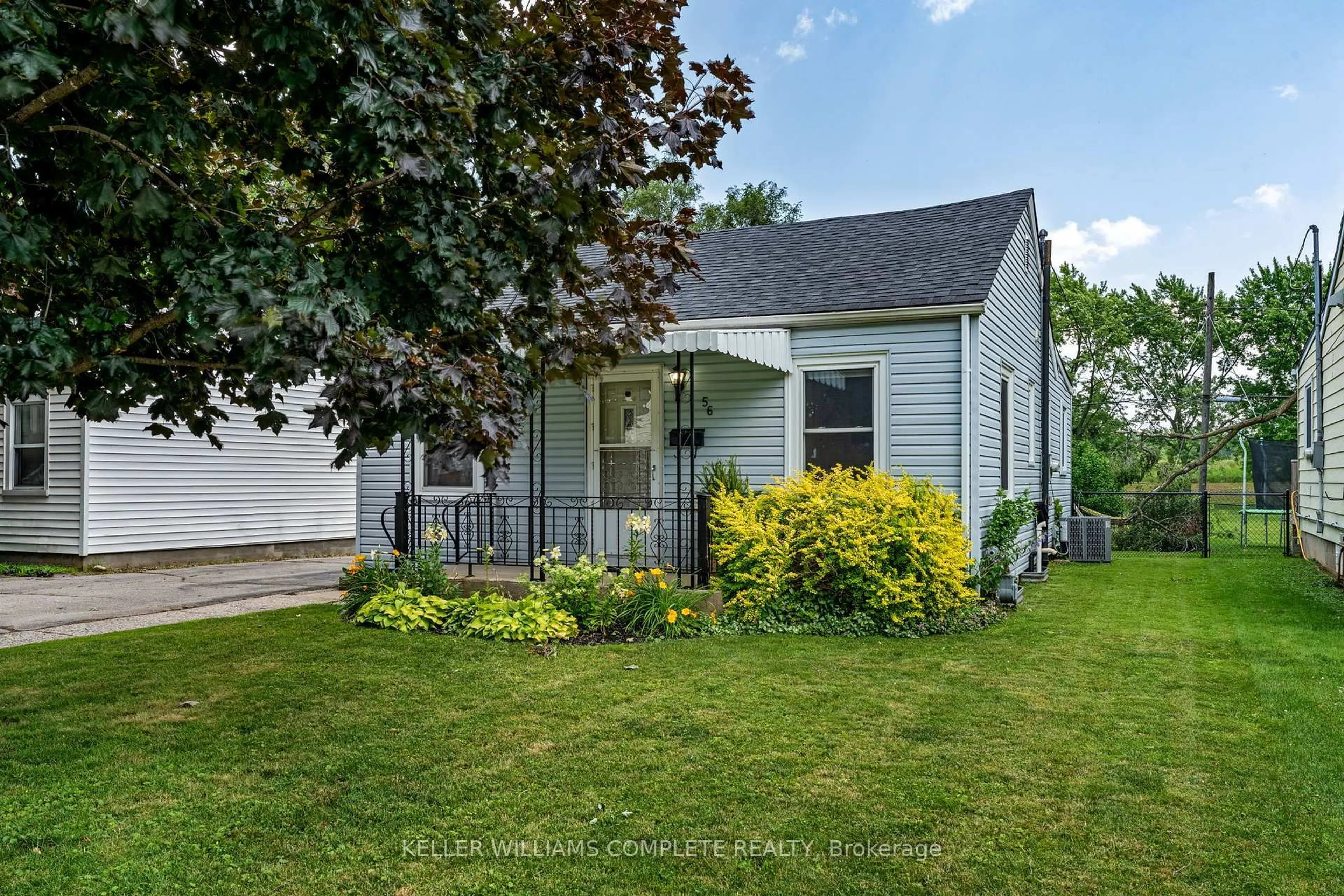 Home with vinyl exterior material, street for 56 Sixth Ave, Brantford Ontario N3S 1A7