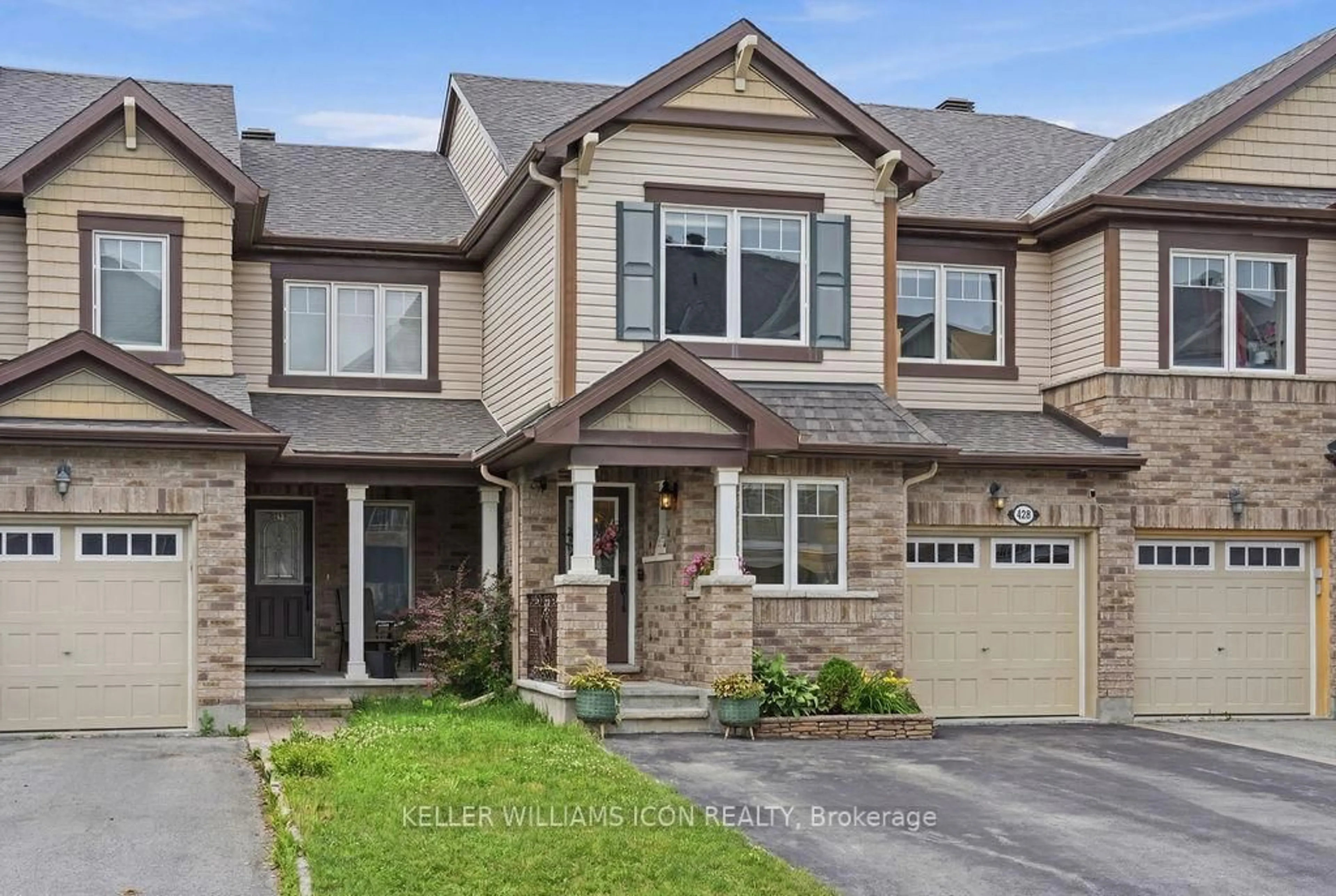 Home with brick exterior material, street for 428 White Arctic Ave, Ottawa Ontario K2J 5Y9
