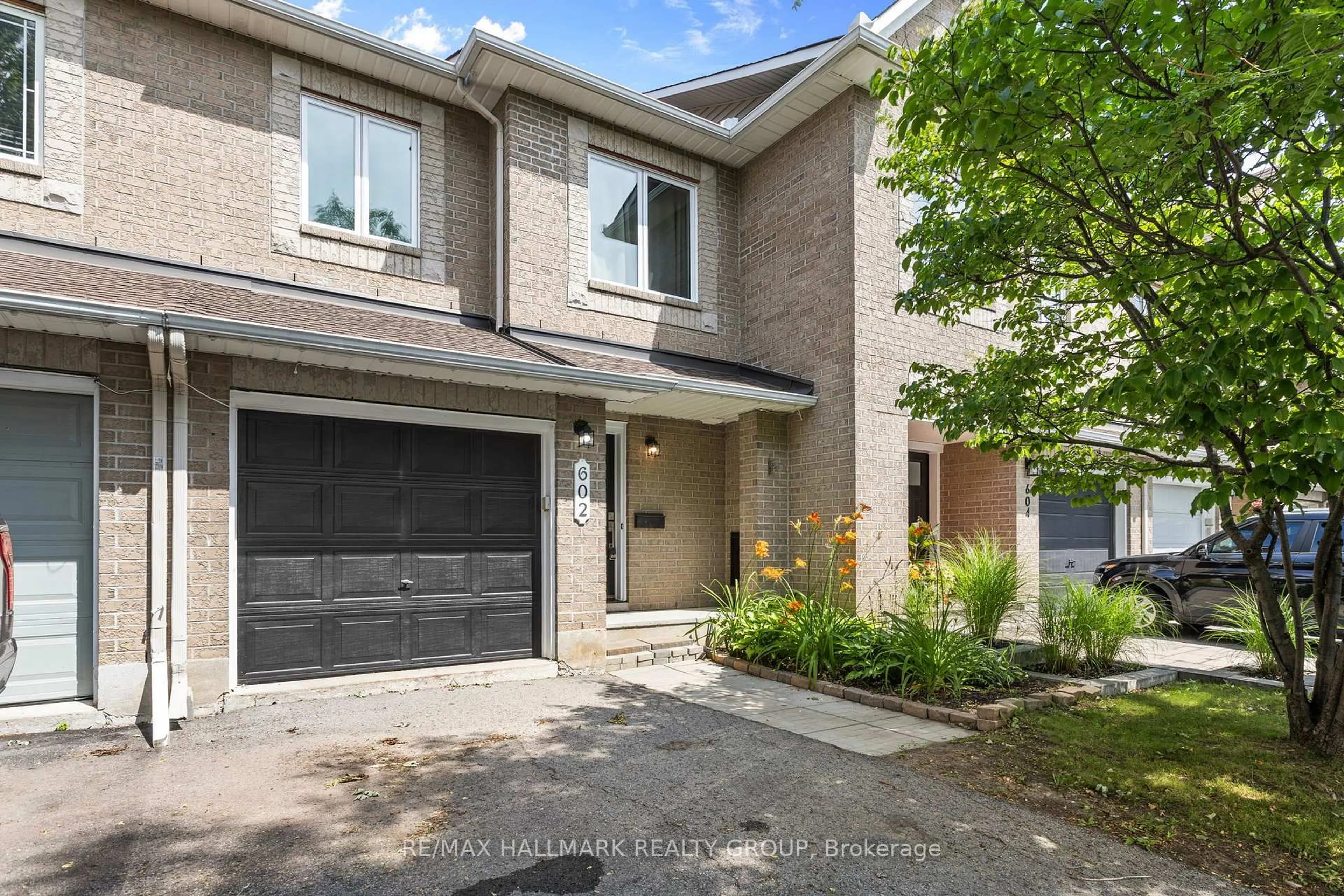 Home with brick exterior material, street for 602 Louis Toscano Dr, Ottawa Ontario K4A 0B2