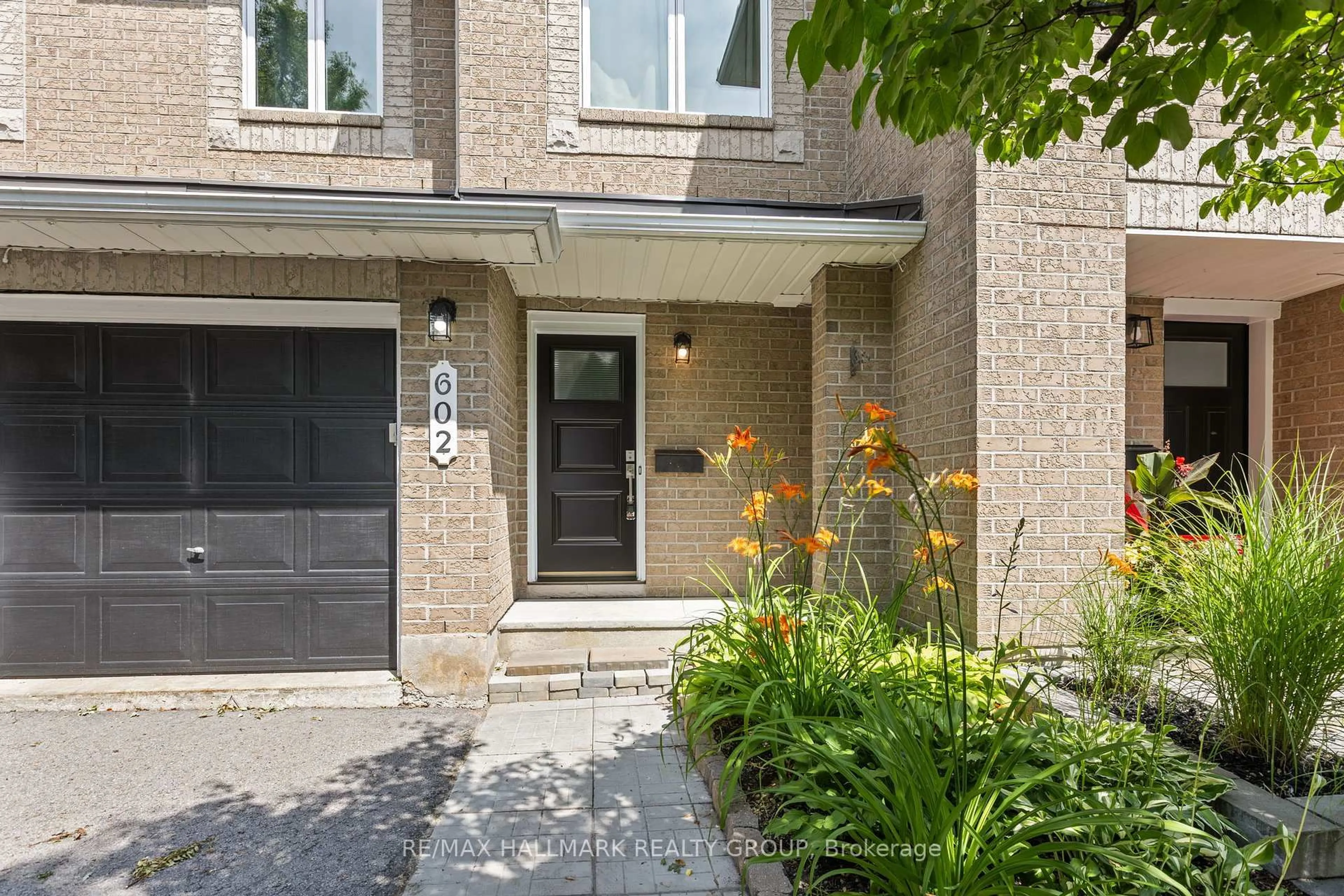 Home with brick exterior material, street for 602 Louis Toscano Dr, Ottawa Ontario K4A 0B2