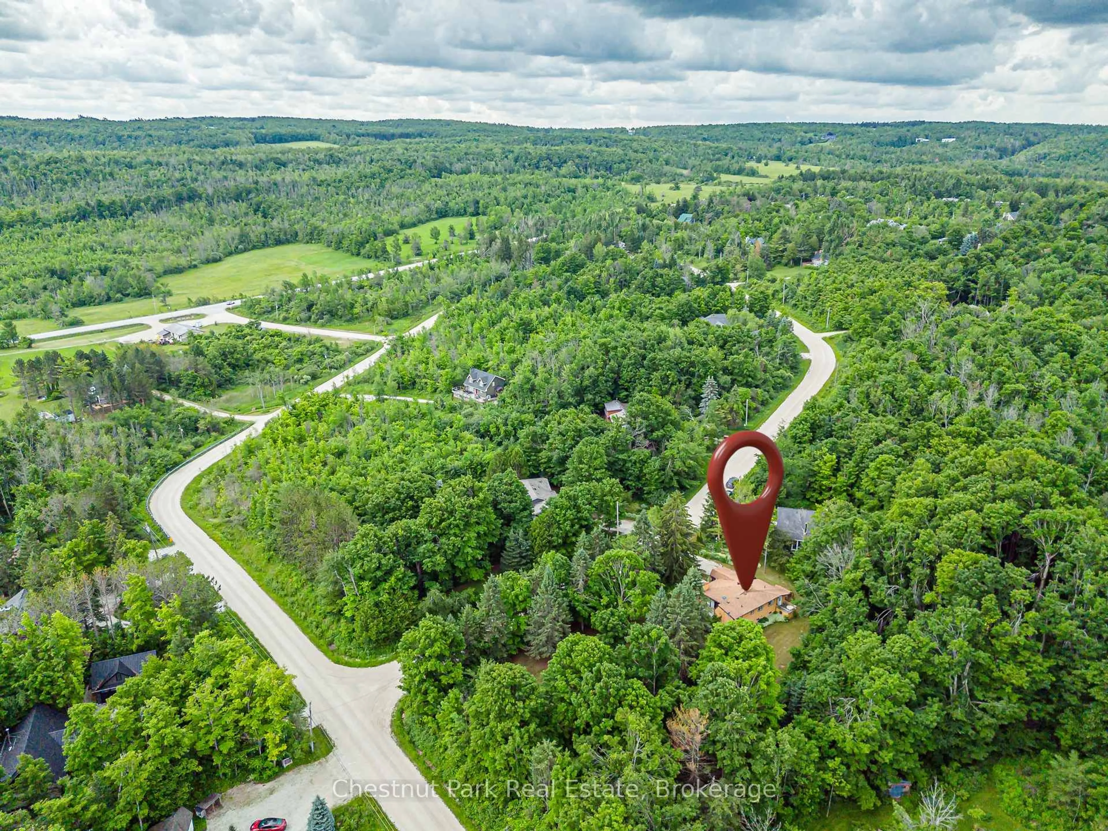 A pic from outside/outdoor area/front of a property/back of a property/a pic from drone, forest/trees view for 138 Kionontio Tr, Blue Mountains Ontario L9Y 0R6
