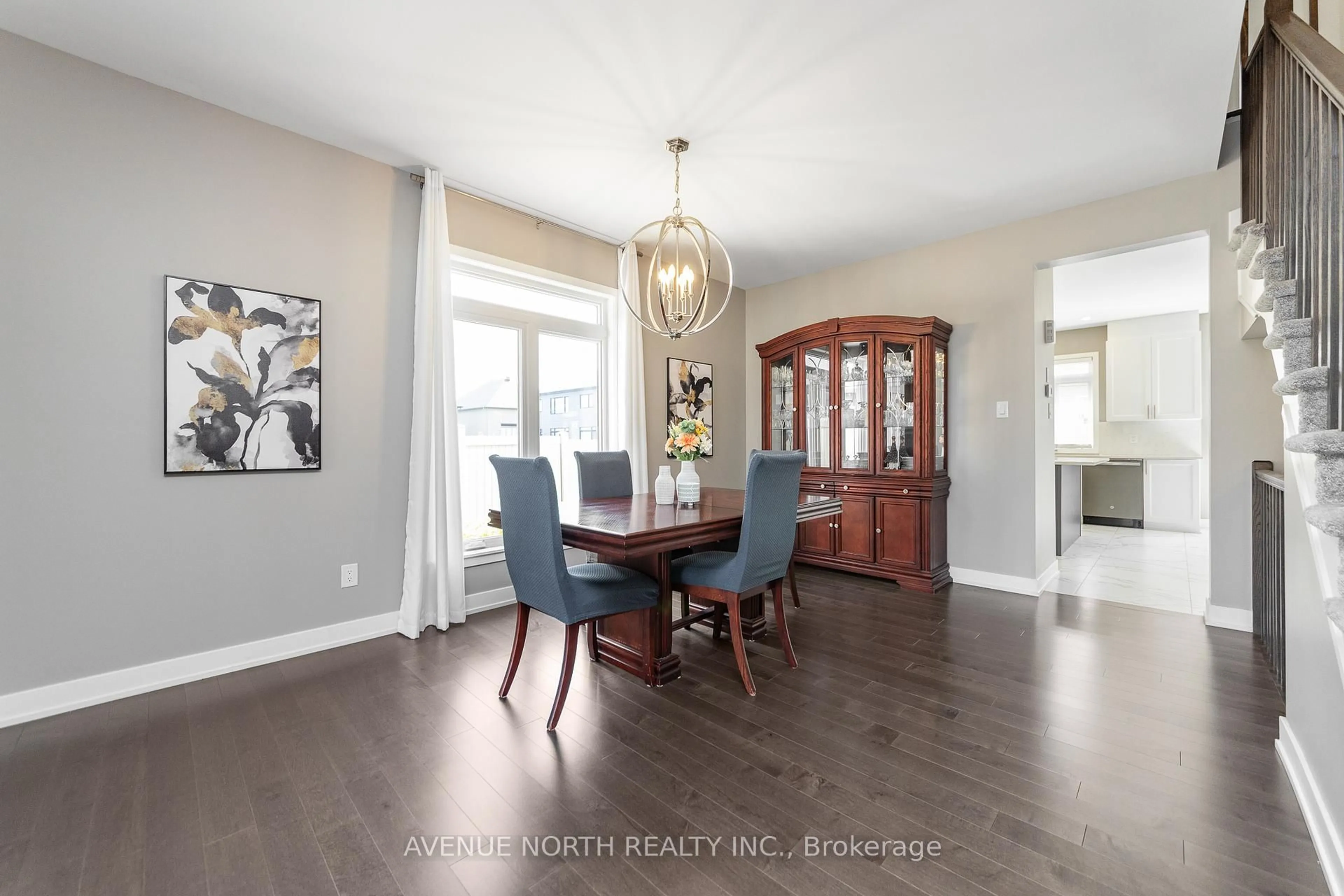Dining room, wood/laminate floor for 206 Reisling Way, Ottawa Ontario K1T 0X1
