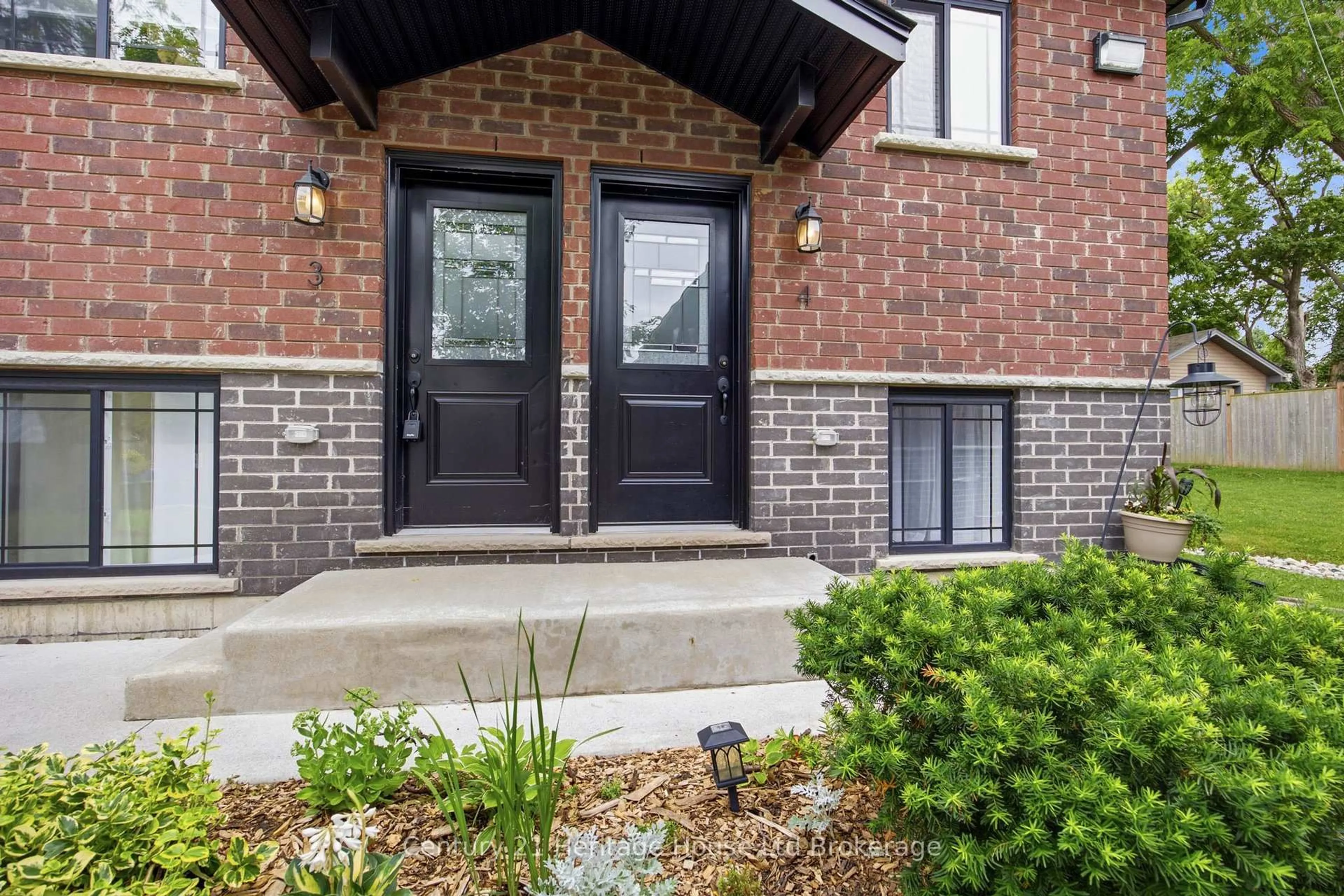 Home with brick exterior material, street for 34 Bain St #4, Woodstock Ontario N4S 5X8