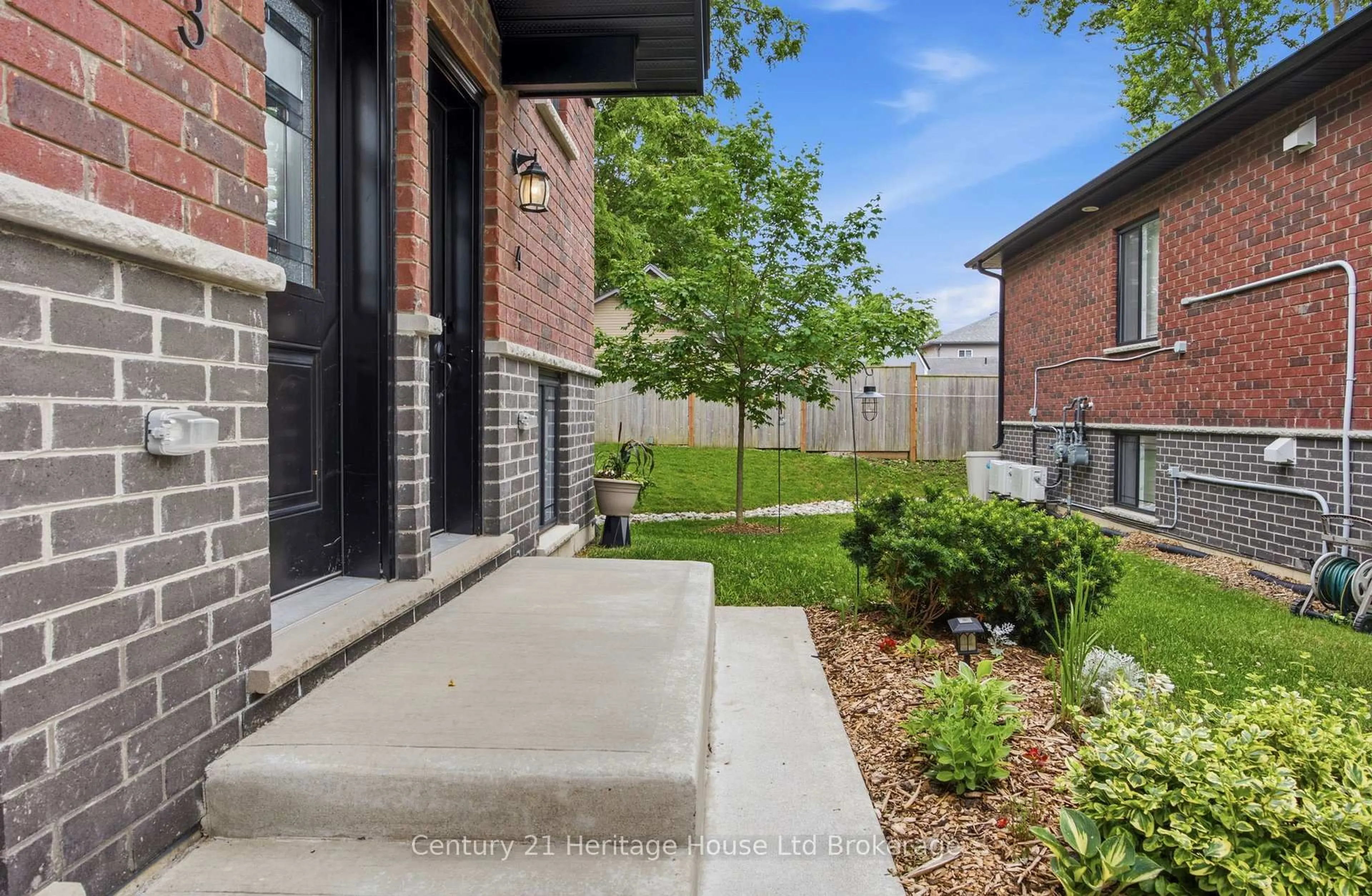 Home with brick exterior material, street for 34 Bain St #4, Woodstock Ontario N4S 5X8