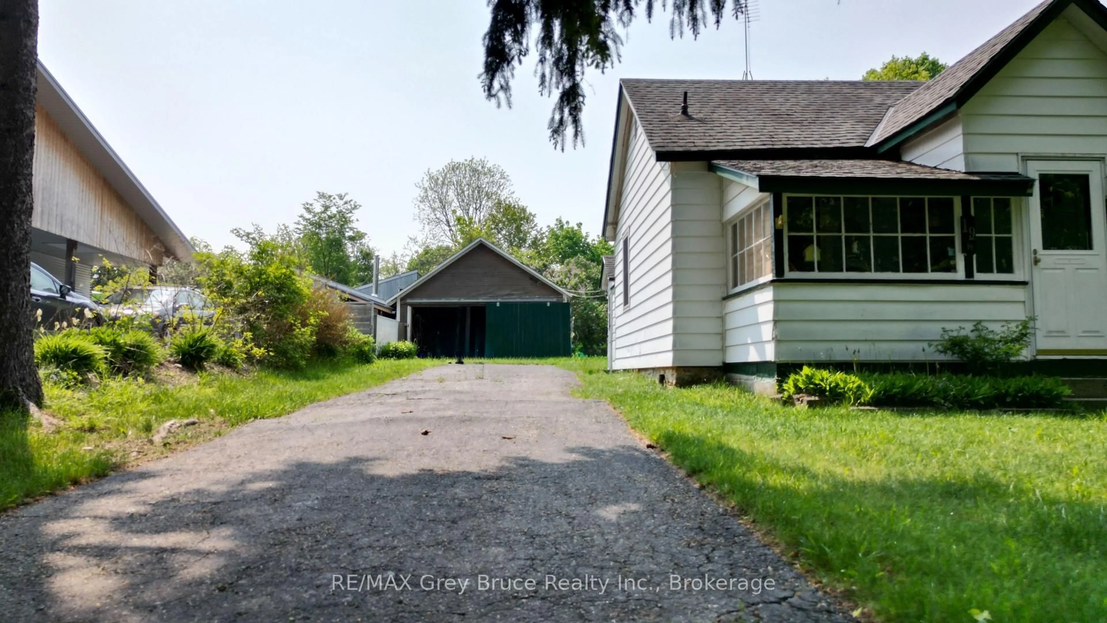 A pic from outside/outdoor area/front of a property/back of a property/a pic from drone, street for 19 Mill St, Northern Bruce Peninsula Ontario N0H 1W0