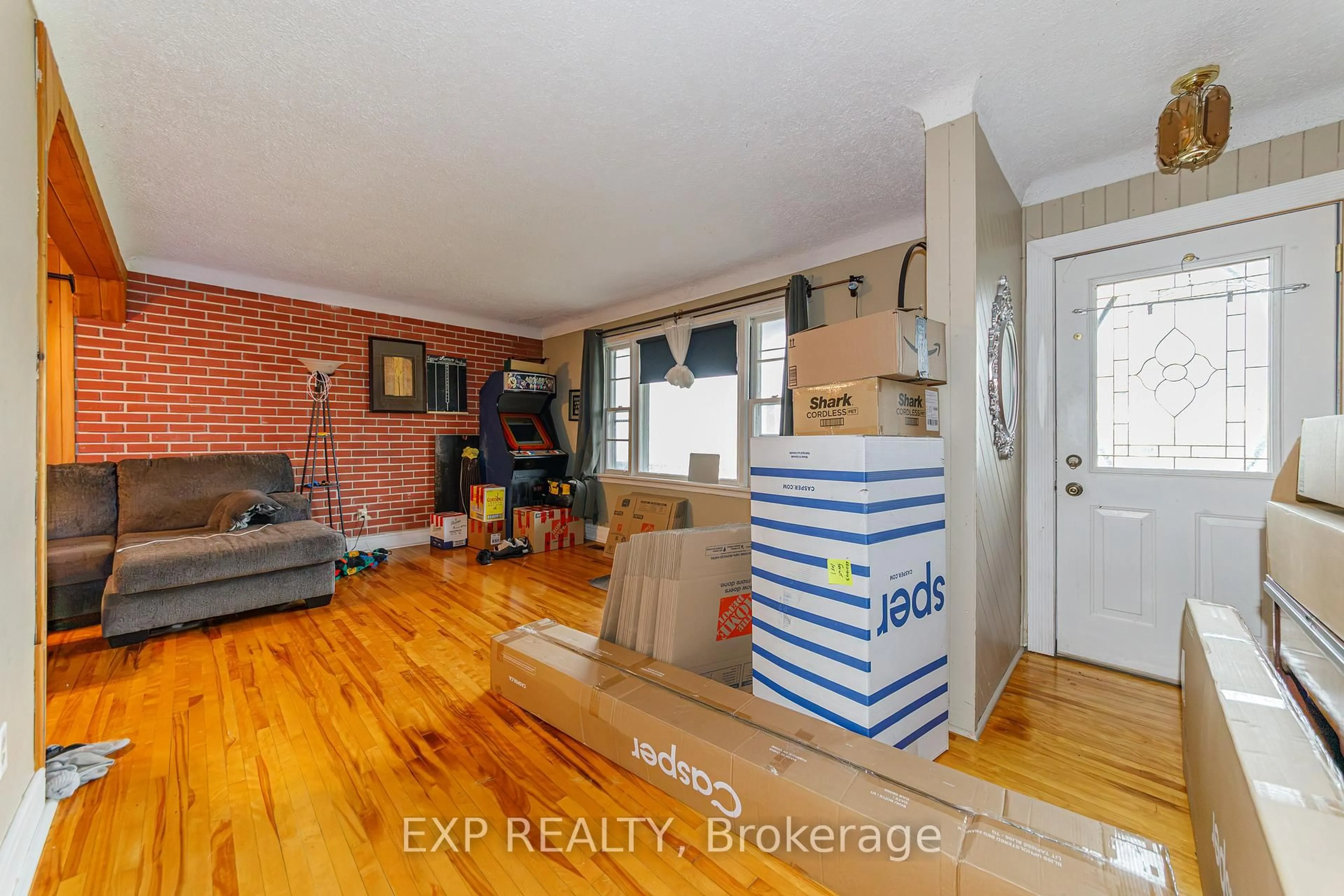 Living room with furniture, unknown for 789 Blair Rd, Ottawa Ontario K1J 7M5