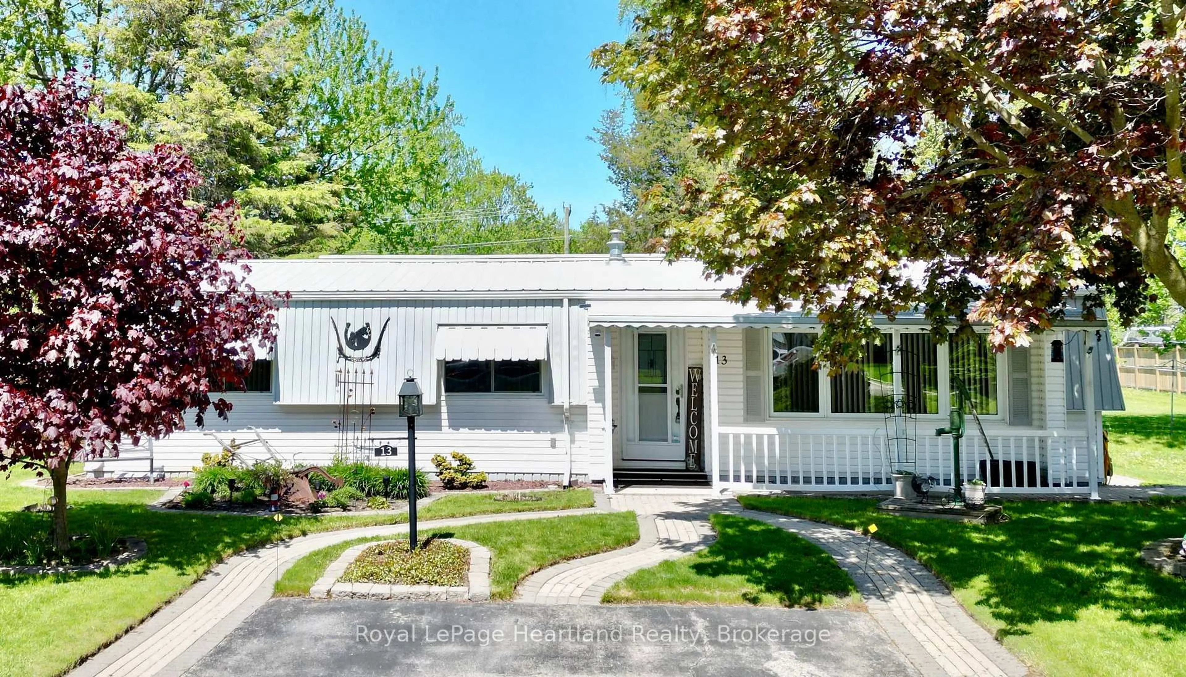 Home with vinyl exterior material, street for 13 Cypress Point Cres, South Huron Ontario N0M 1T0