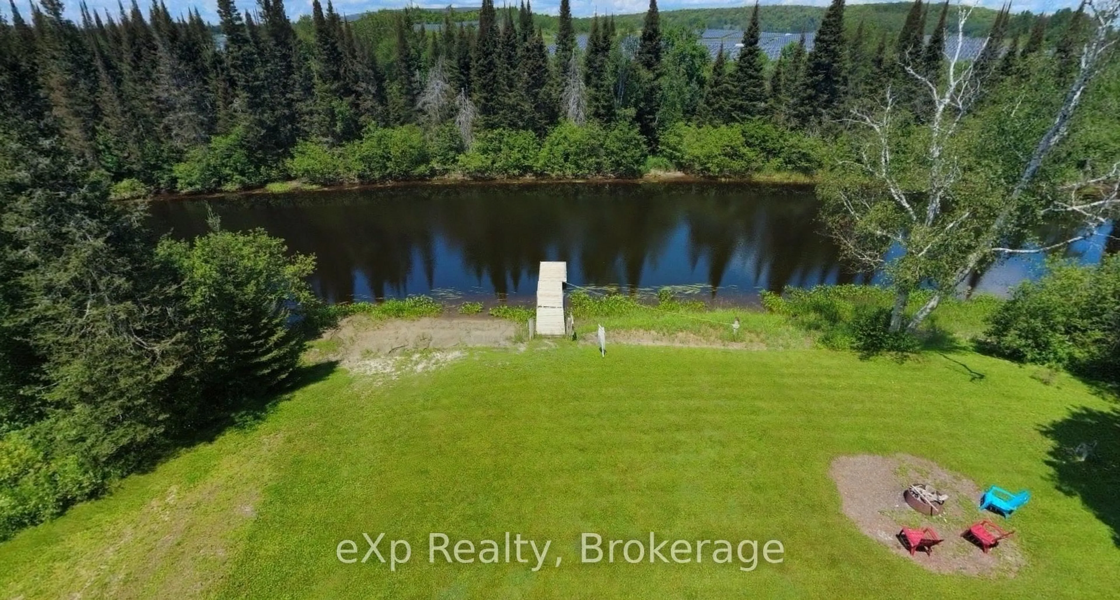 A pic from outside/outdoor area/front of a property/back of a property/a pic from drone, water/lake/river/ocean view for 249 River Dr, Burk's Falls Ontario P0A 1C0