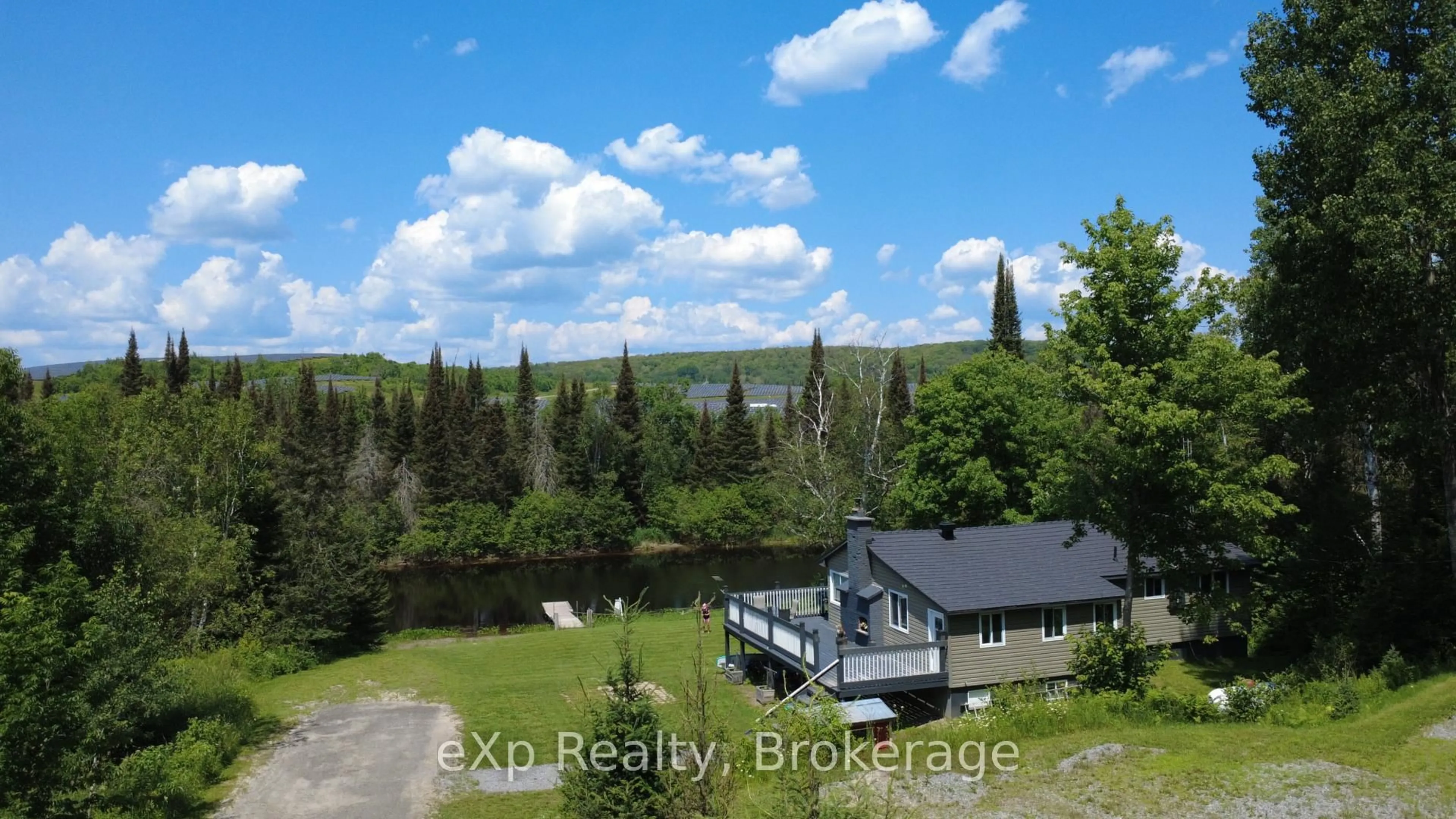 A pic from outside/outdoor area/front of a property/back of a property/a pic from drone, water/lake/river/ocean view for 249 River Dr, Burk's Falls Ontario P0A 1C0