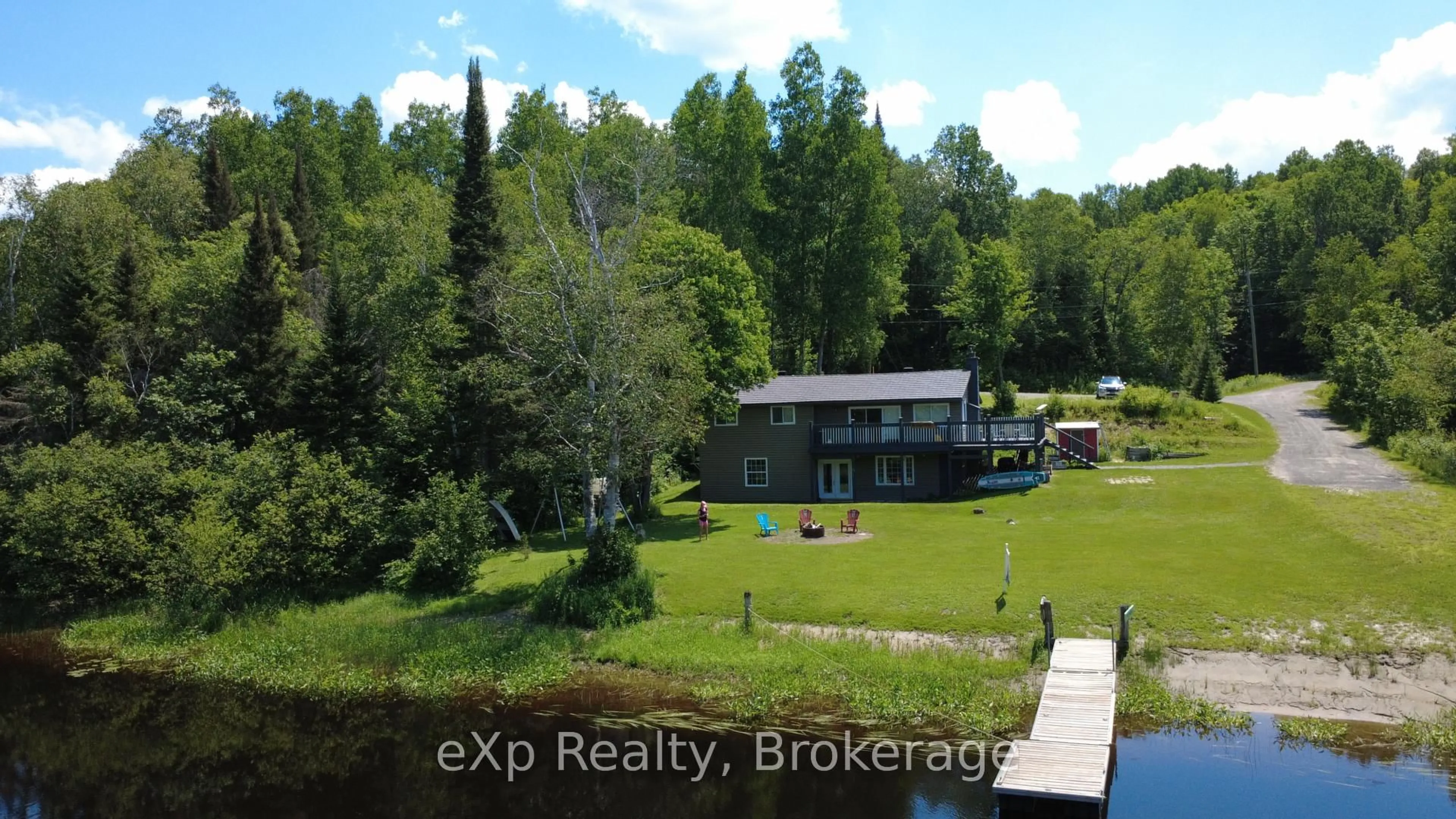 A pic from outside/outdoor area/front of a property/back of a property/a pic from drone, water/lake/river/ocean view for 249 River Dr, Burk's Falls Ontario P0A 1C0