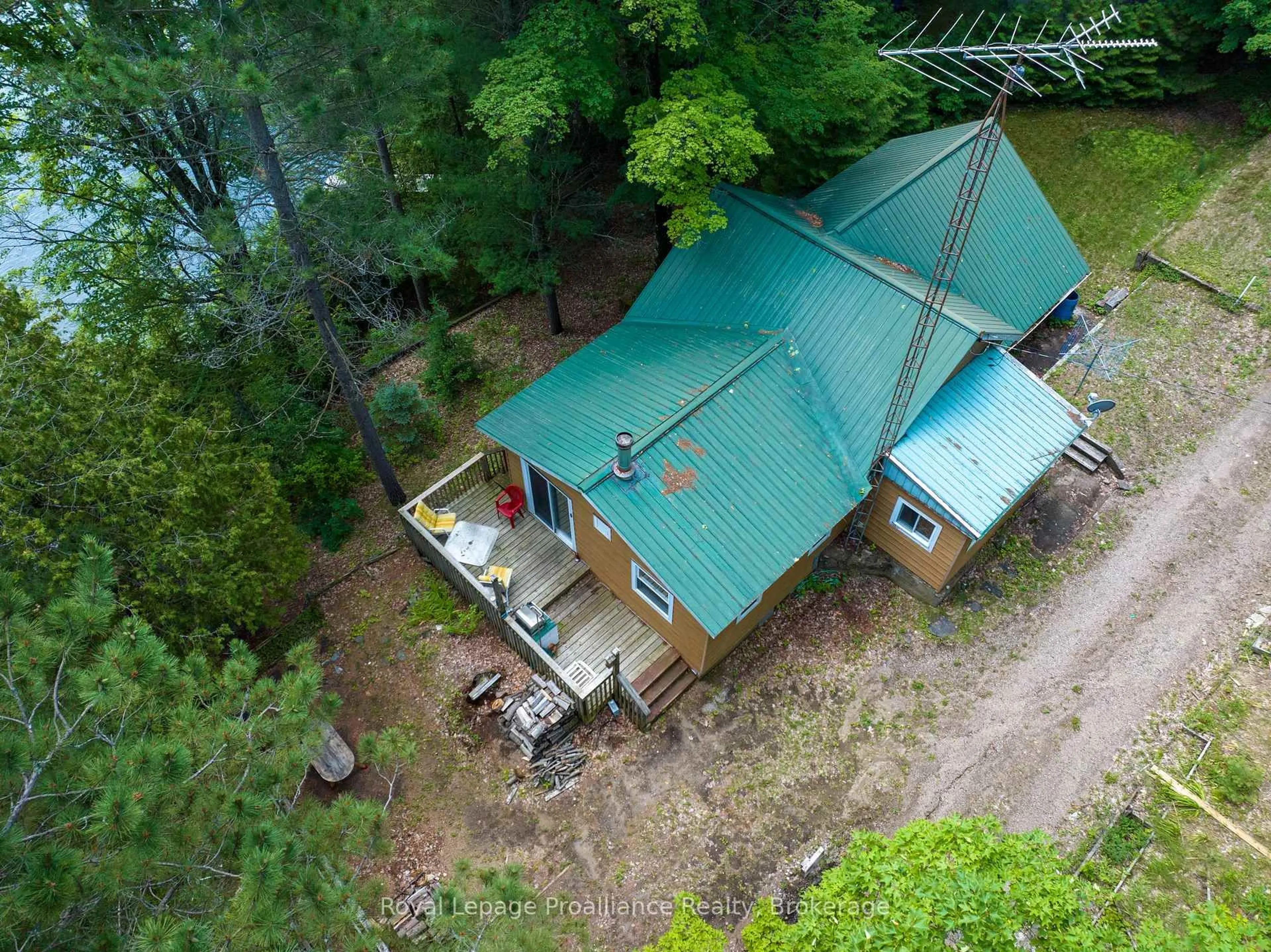 A pic from outside/outdoor area/front of a property/back of a property/a pic from drone, forest/trees view for 1166 Rocky Lane, Cloyne Ontario K0H 1K0