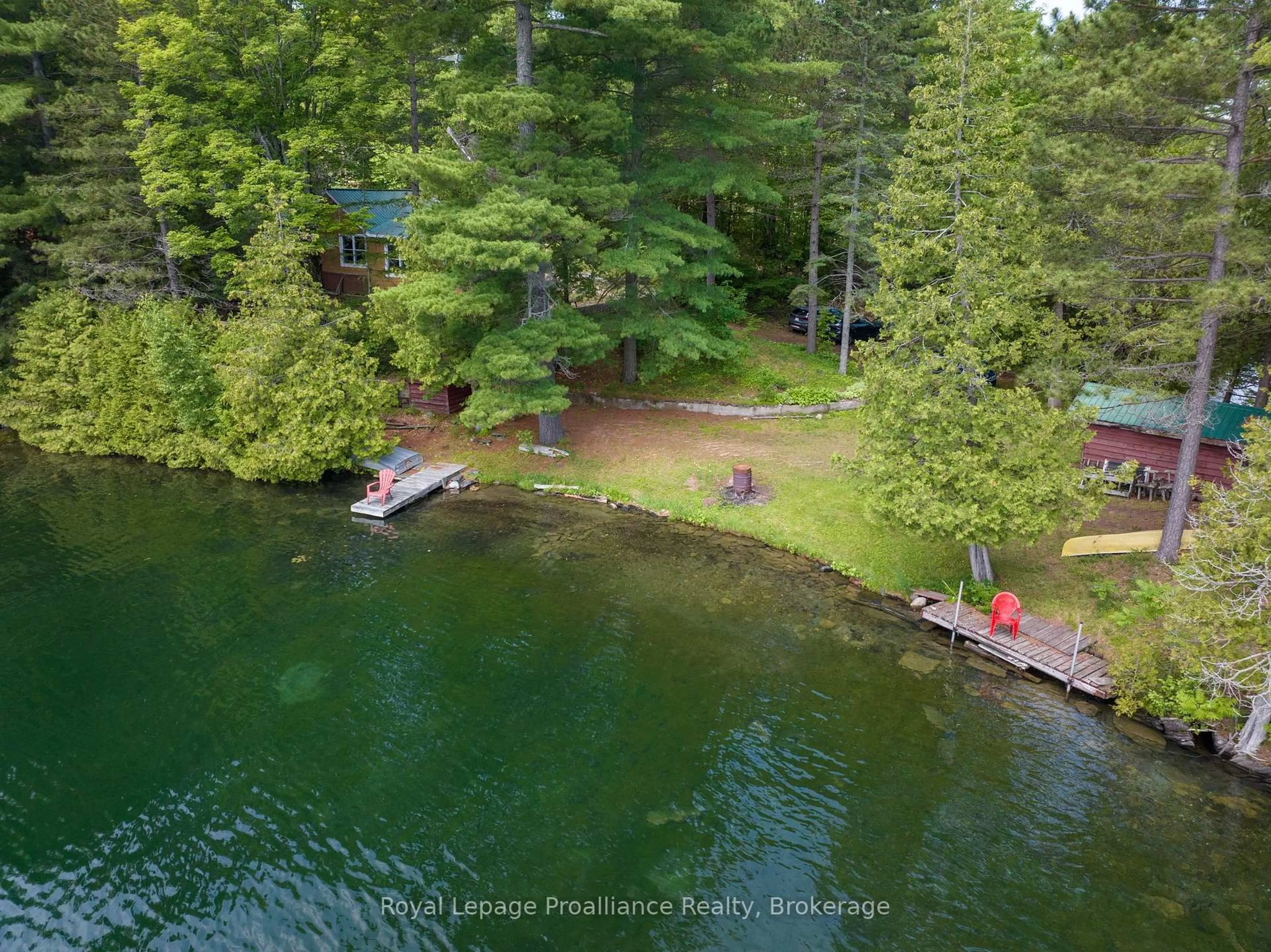 A pic from outside/outdoor area/front of a property/back of a property/a pic from drone, water/lake/river/ocean view for 1166 Rocky Lane, Cloyne Ontario K0H 1K0