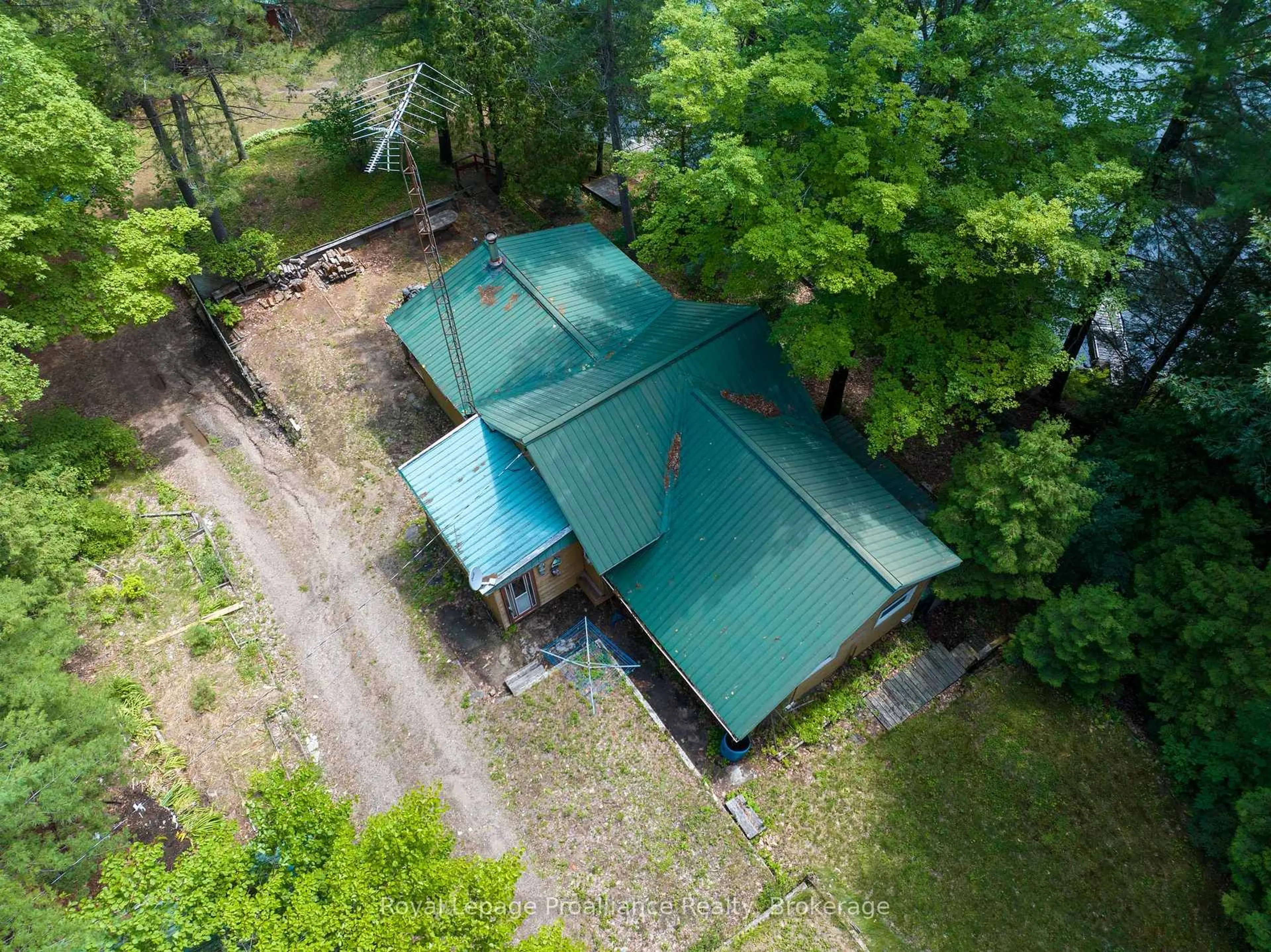 A pic from outside/outdoor area/front of a property/back of a property/a pic from drone, forest/trees view for 1166 Rocky Lane, Cloyne Ontario K0H 1K0