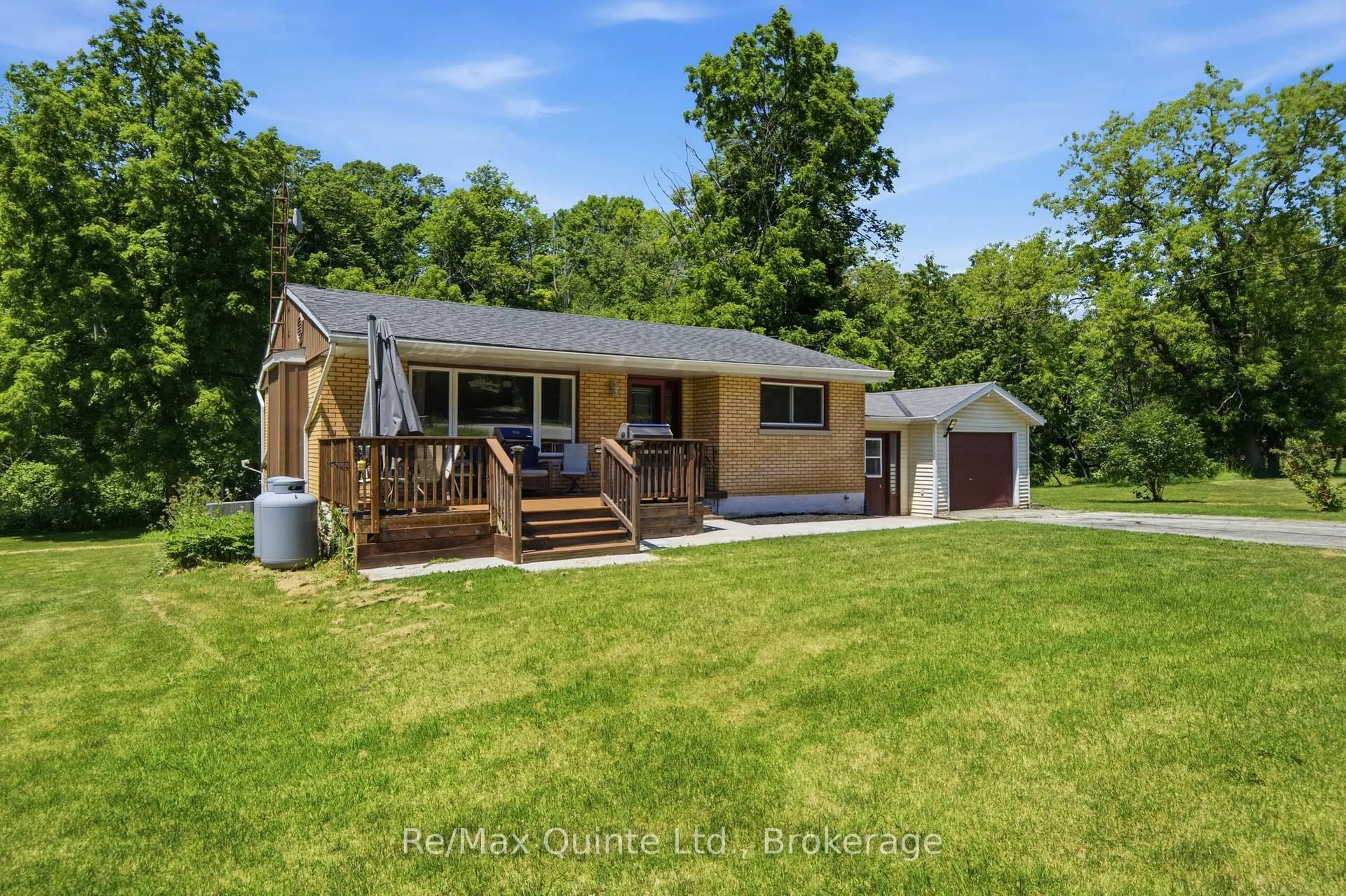 A pic from outside/outdoor area/front of a property/back of a property/a pic from drone, unknown for 634 County Road 30, Brighton Ontario K0K 1H0