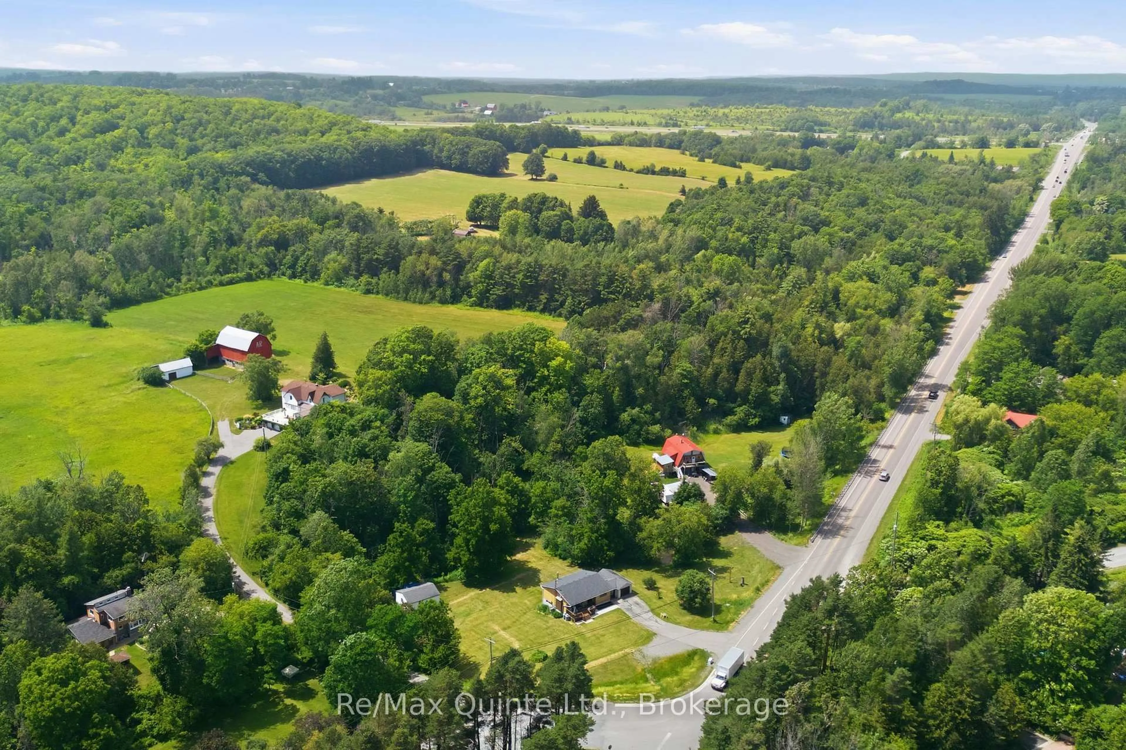 A pic from outside/outdoor area/front of a property/back of a property/a pic from drone, forest/trees view for 634 County Road 30, Brighton Ontario K0K 1H0