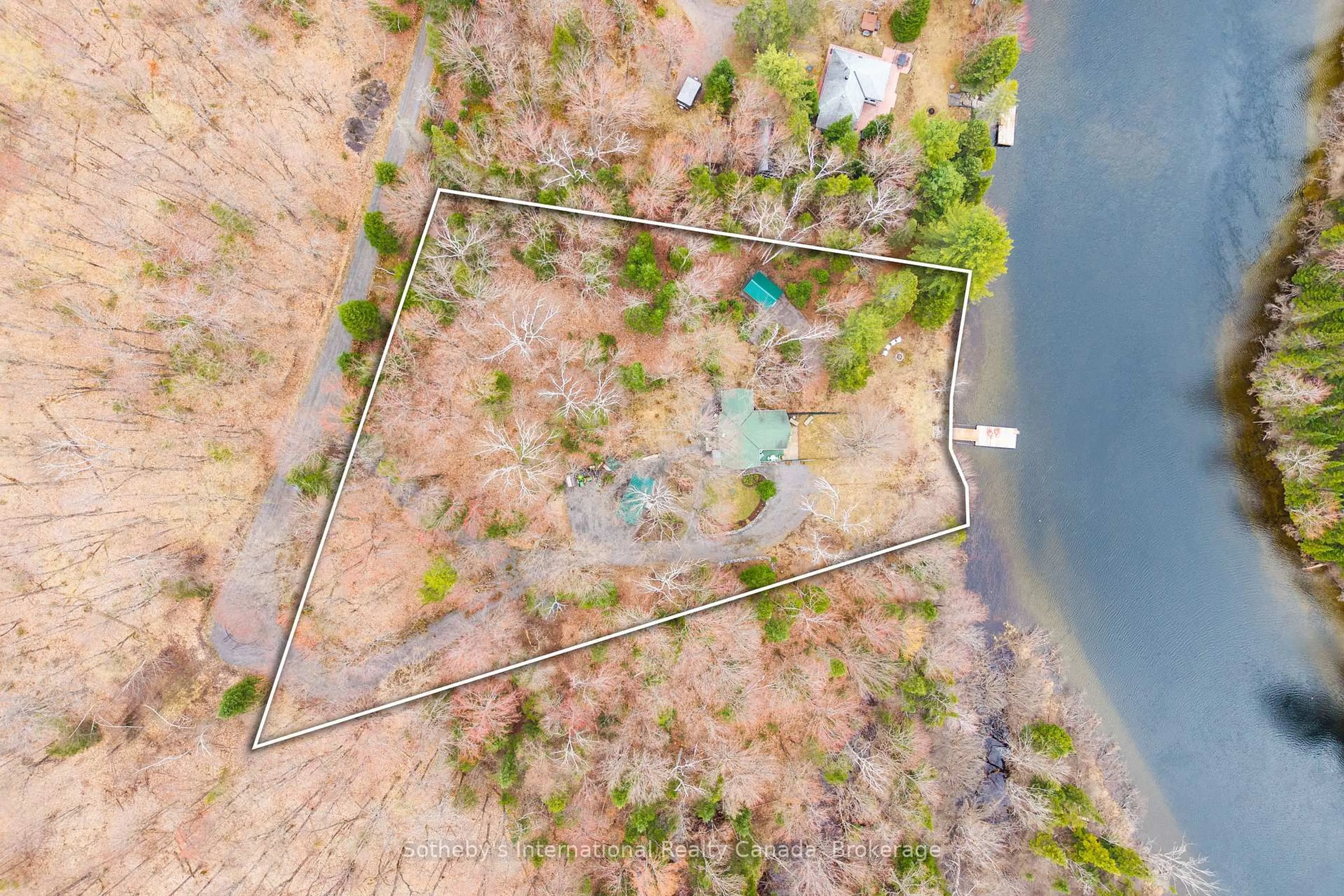 A pic from outside/outdoor area/front of a property/back of a property/a pic from drone, water/lake/river/ocean view for 1041 Crockford Lane, Bracebridge Ontario P1L 1X3