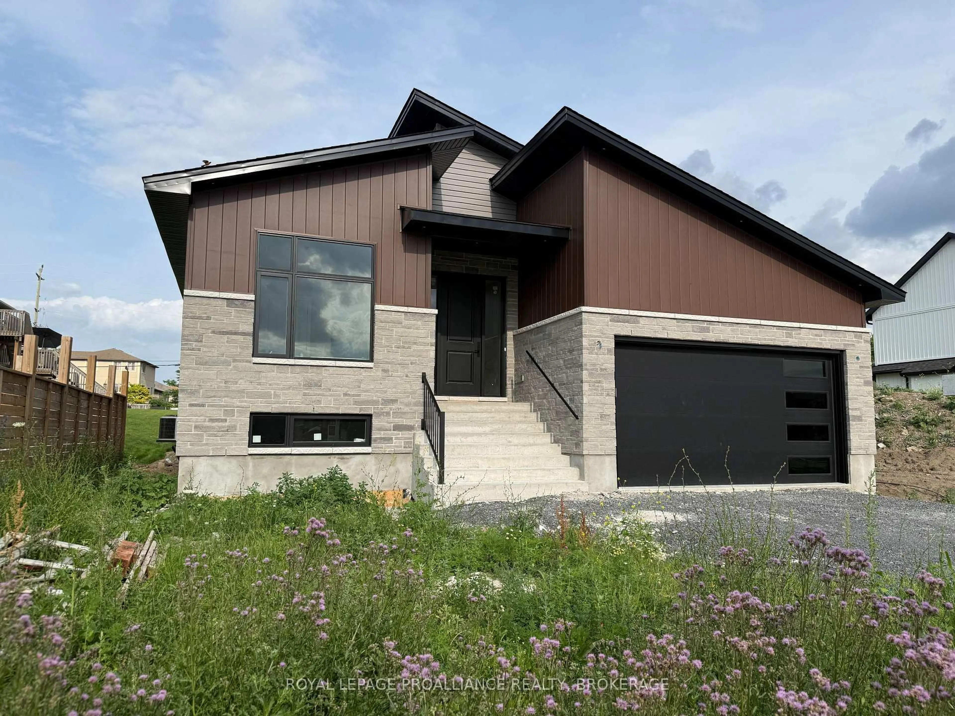 Home with brick exterior material, street for 733 Squirrel Hill Dr, Kingston Ontario K7P 0B2