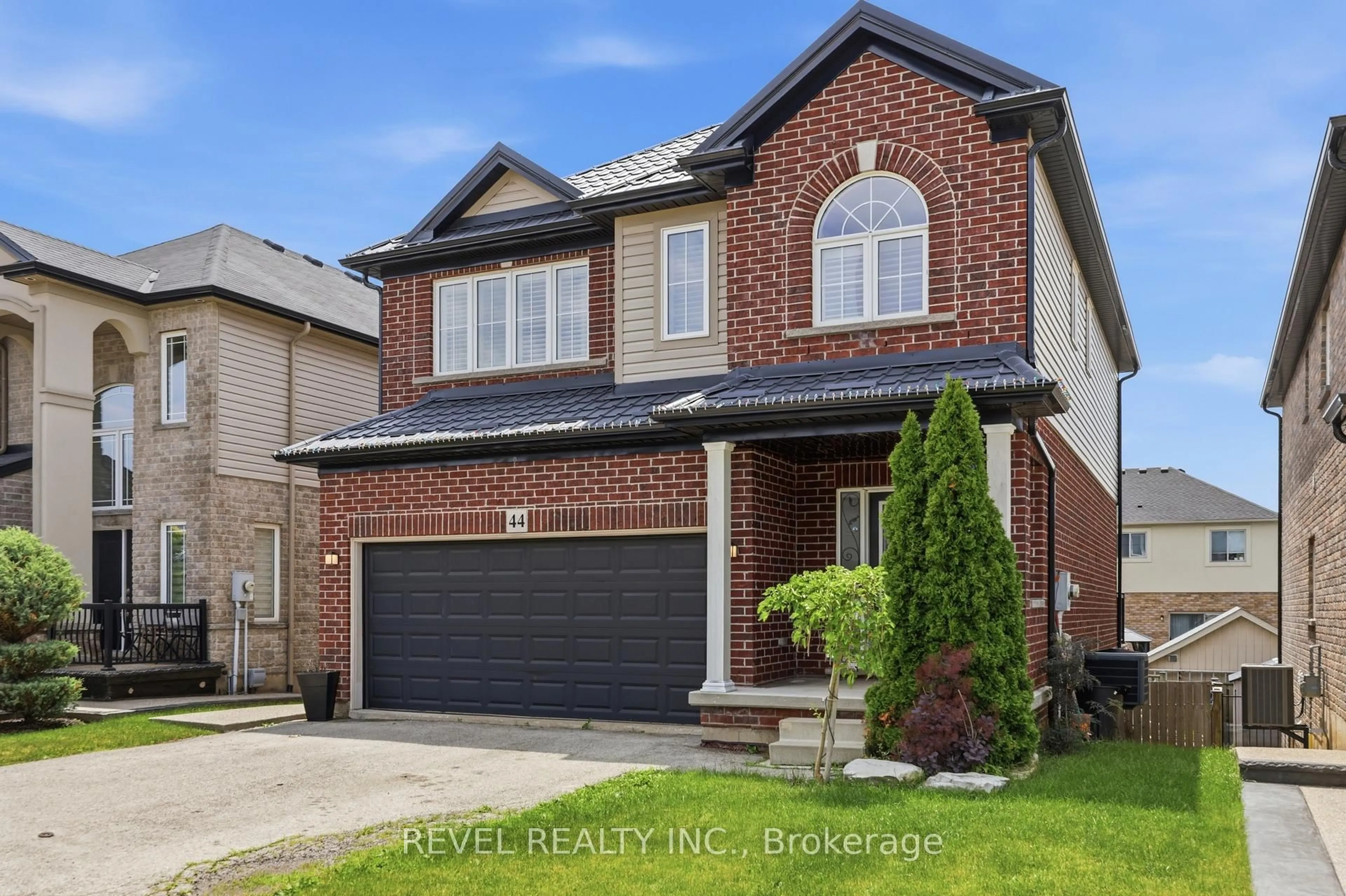 Home with brick exterior material, street for 44 Springwood Dr, Hamilton Ontario L8J 0C3