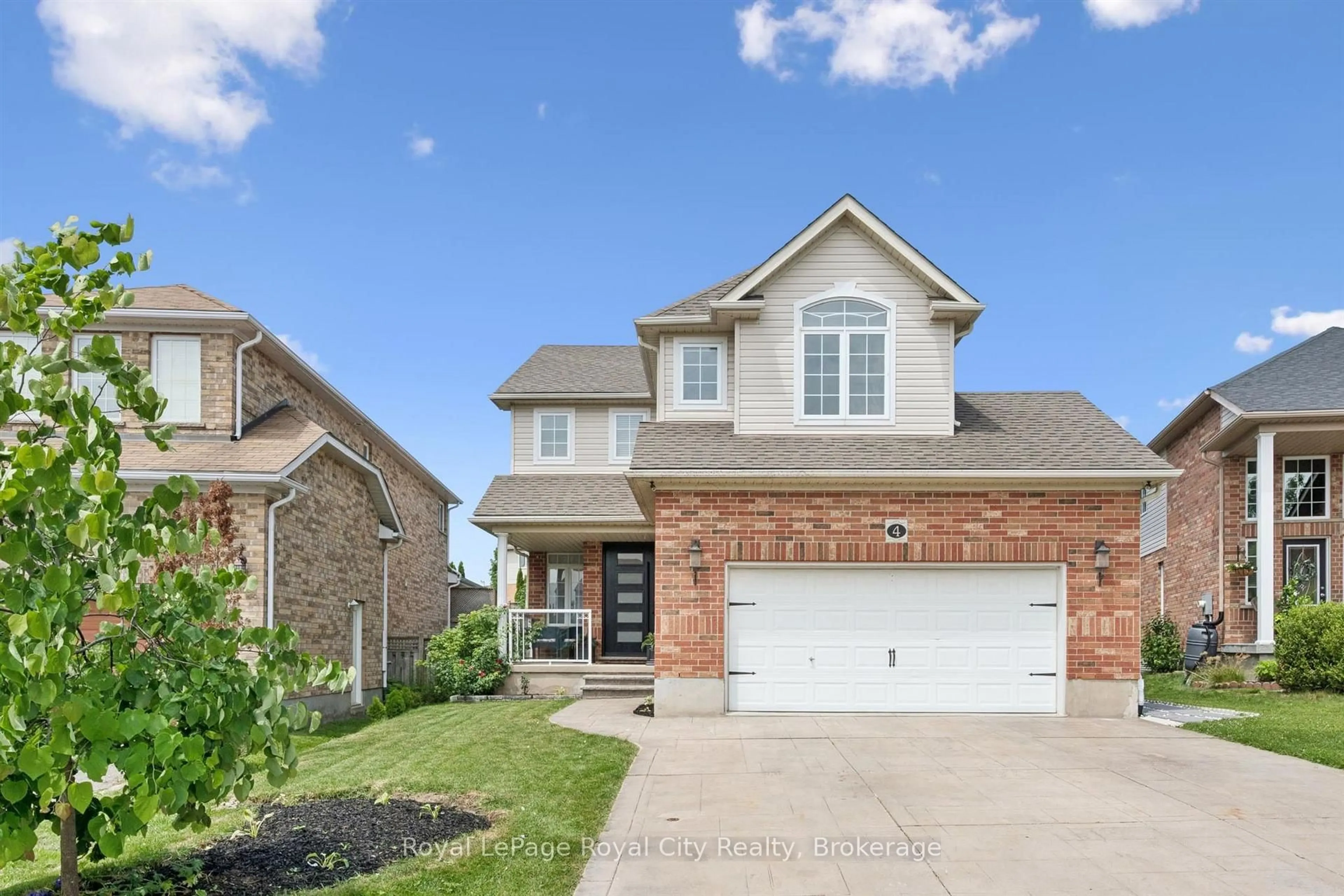 Home with brick exterior material, street for 4 Popham Dr, Guelph Ontario N1E 0B7