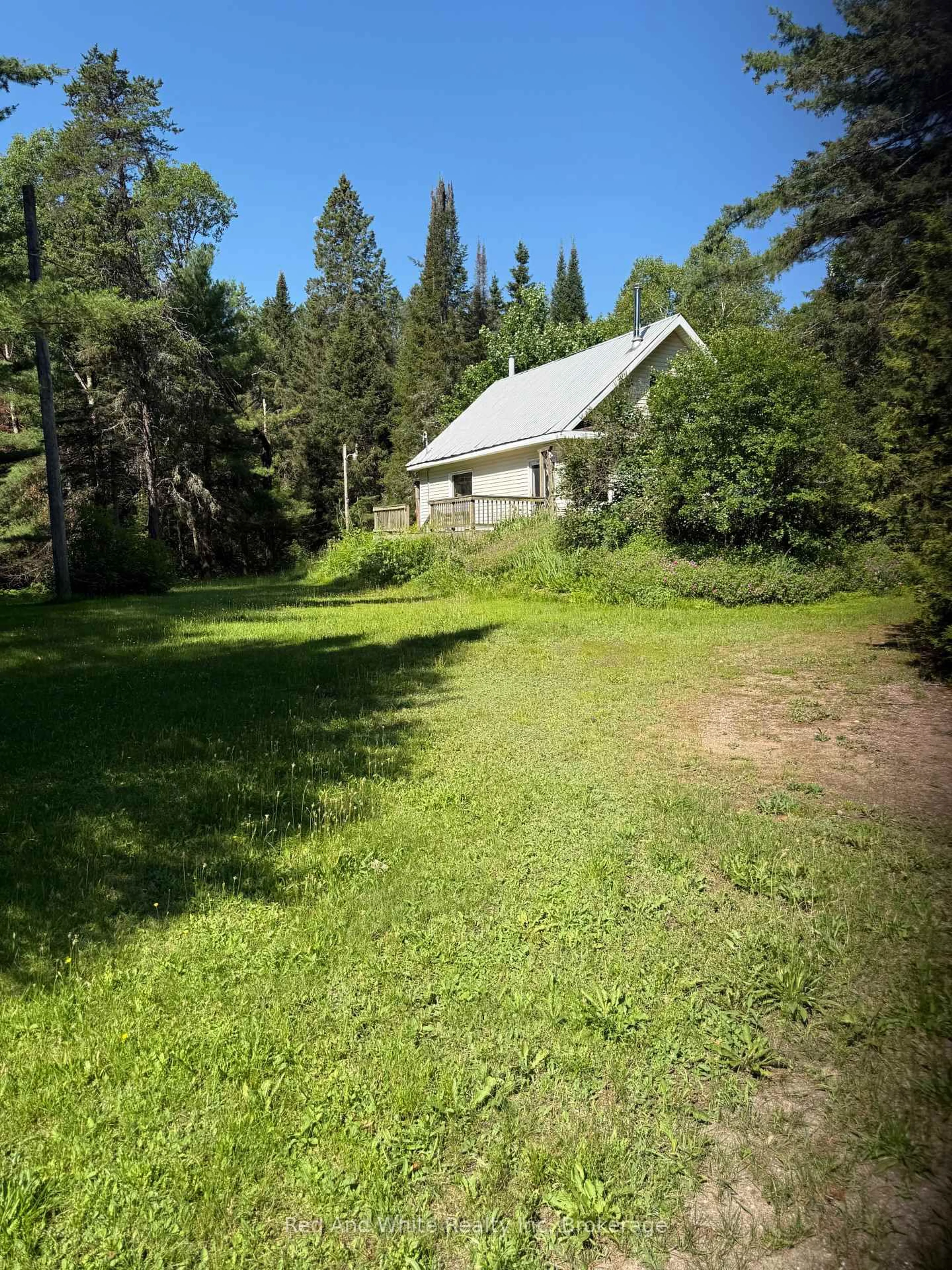 A pic from outside/outdoor area/front of a property/back of a property/a pic from drone, forest/trees view for 944 Hwy 592 Highway, Perry Ontario P0A 1J0