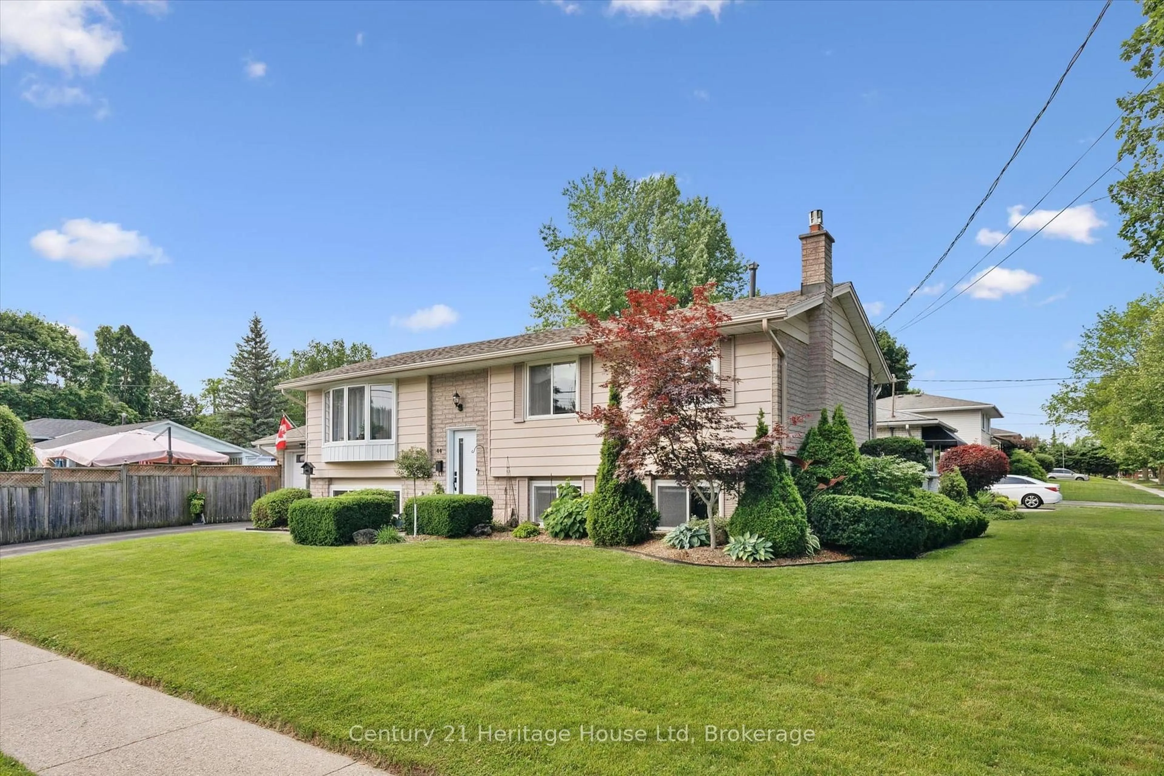Home with vinyl exterior material, street for 44 Inverness Dr, Guelph Ontario N1E 6K3