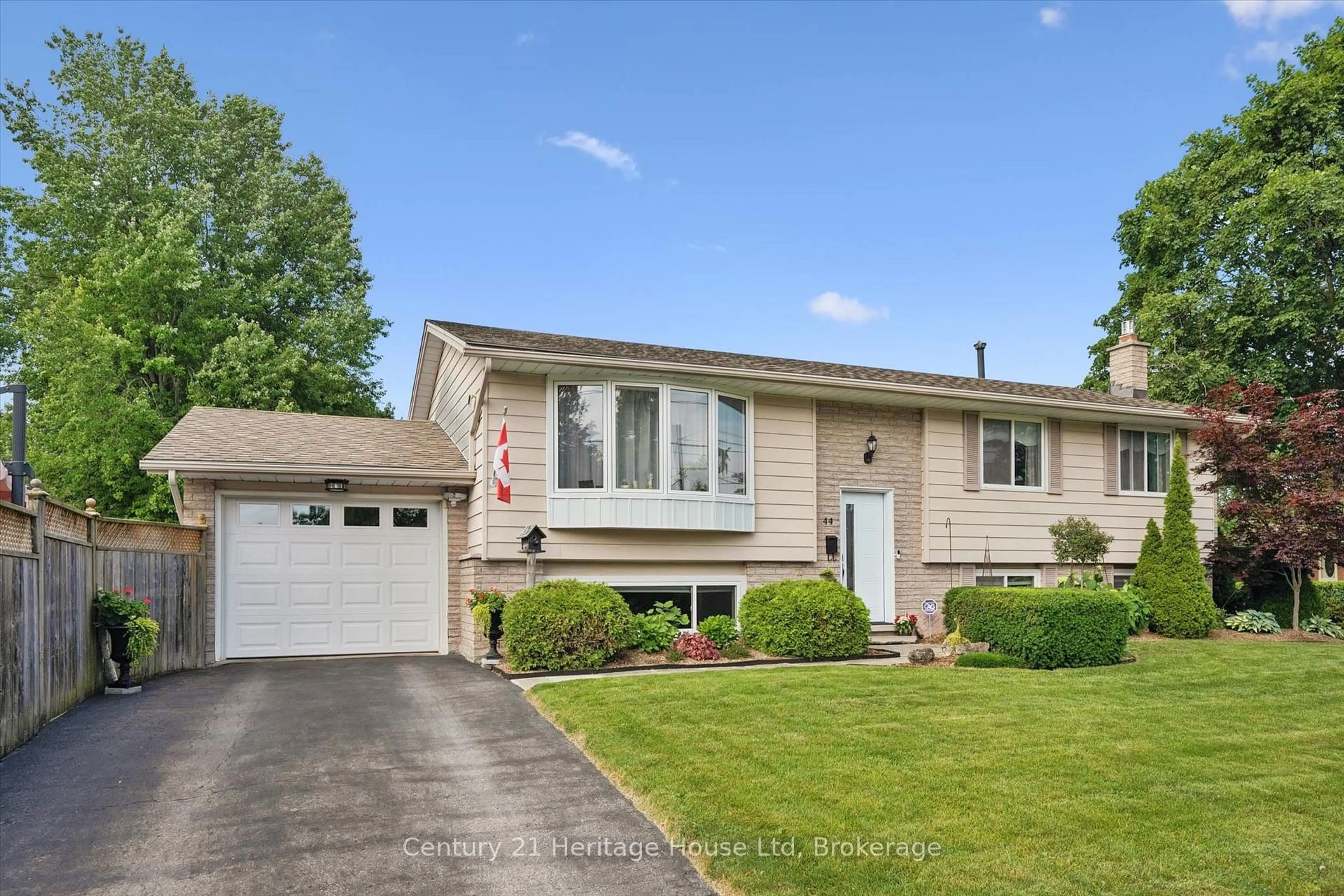 Home with vinyl exterior material, street for 44 Inverness Dr, Guelph Ontario N1E 6K3