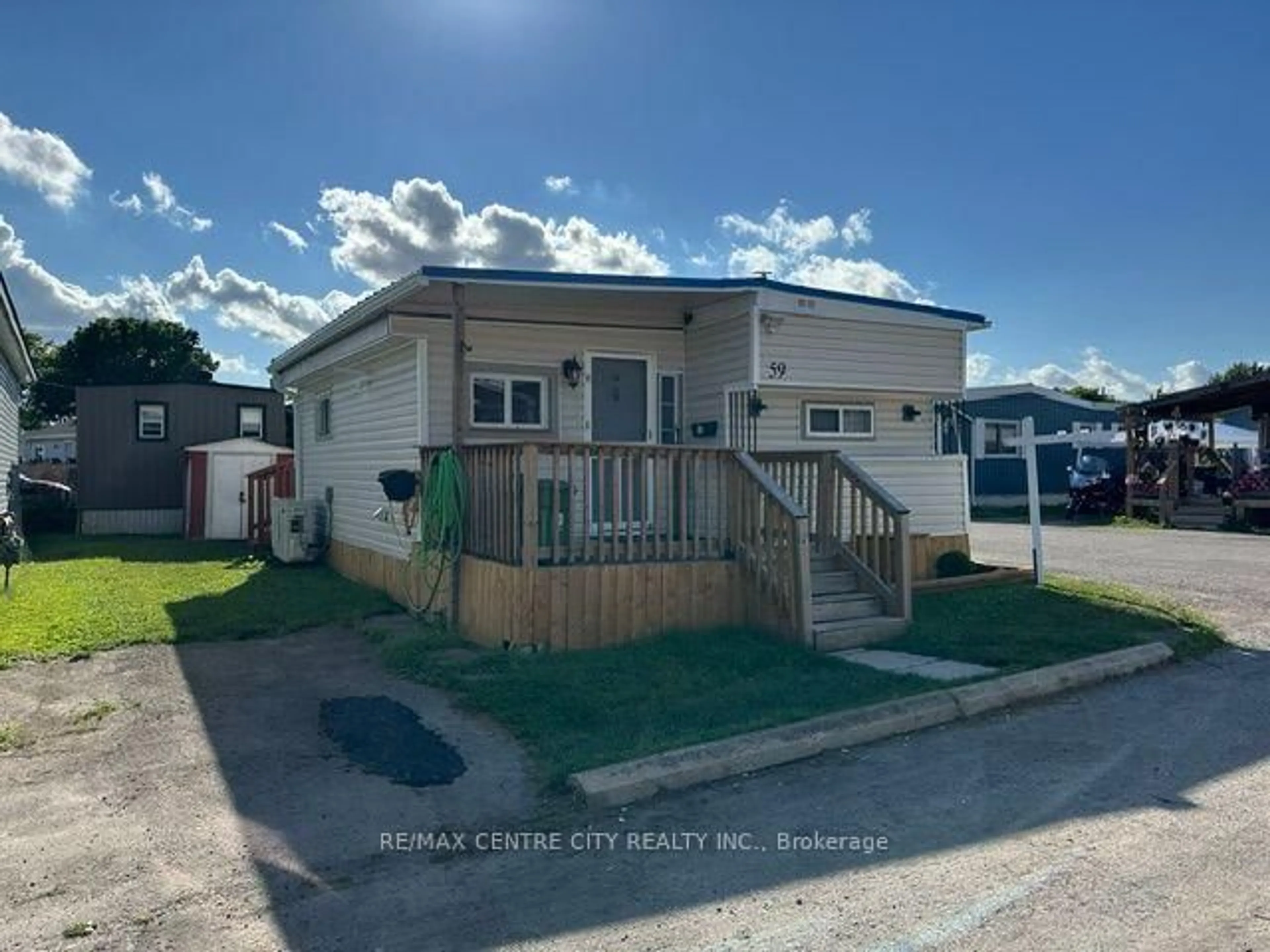 A pic from outside/outdoor area/front of a property/back of a property/a pic from drone, street for 2189 Dundas St #59, London East Ontario N5V 1H3
