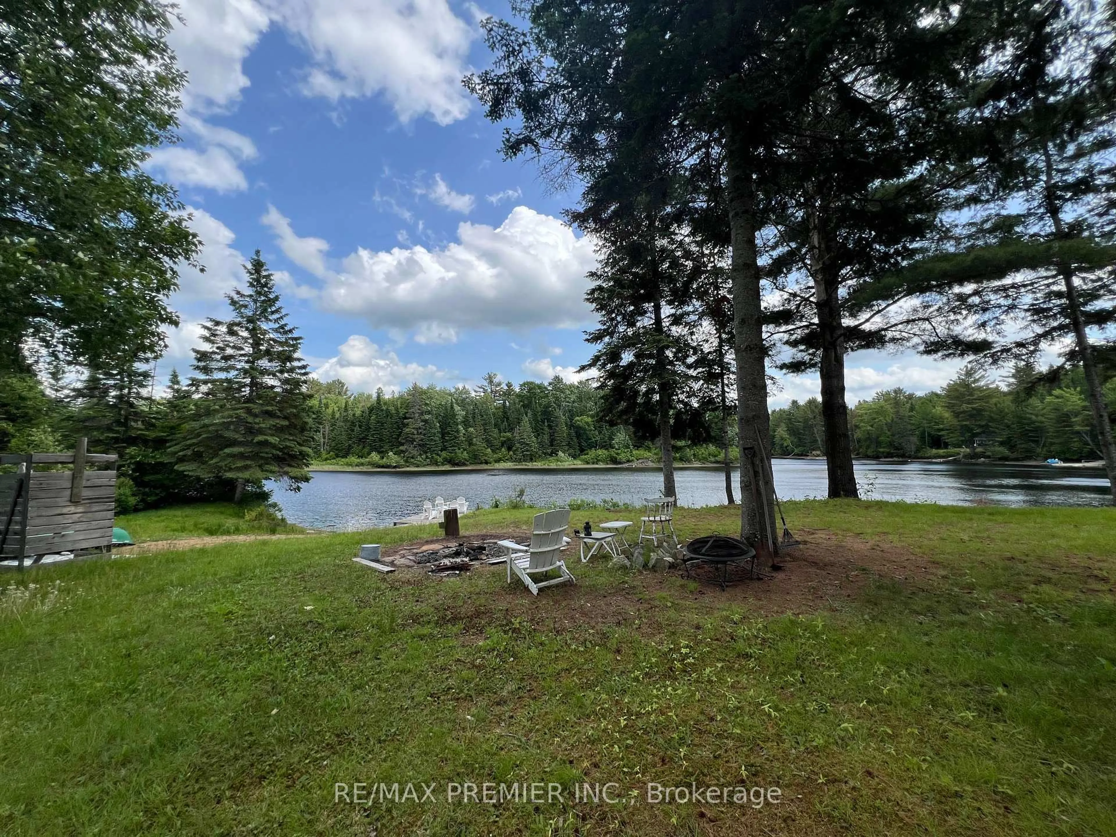 A pic from outside/outdoor area/front of a property/back of a property/a pic from drone, water/lake/river/ocean view for 1130 Colony Rd, Bracebridge Ontario P1L 1X3