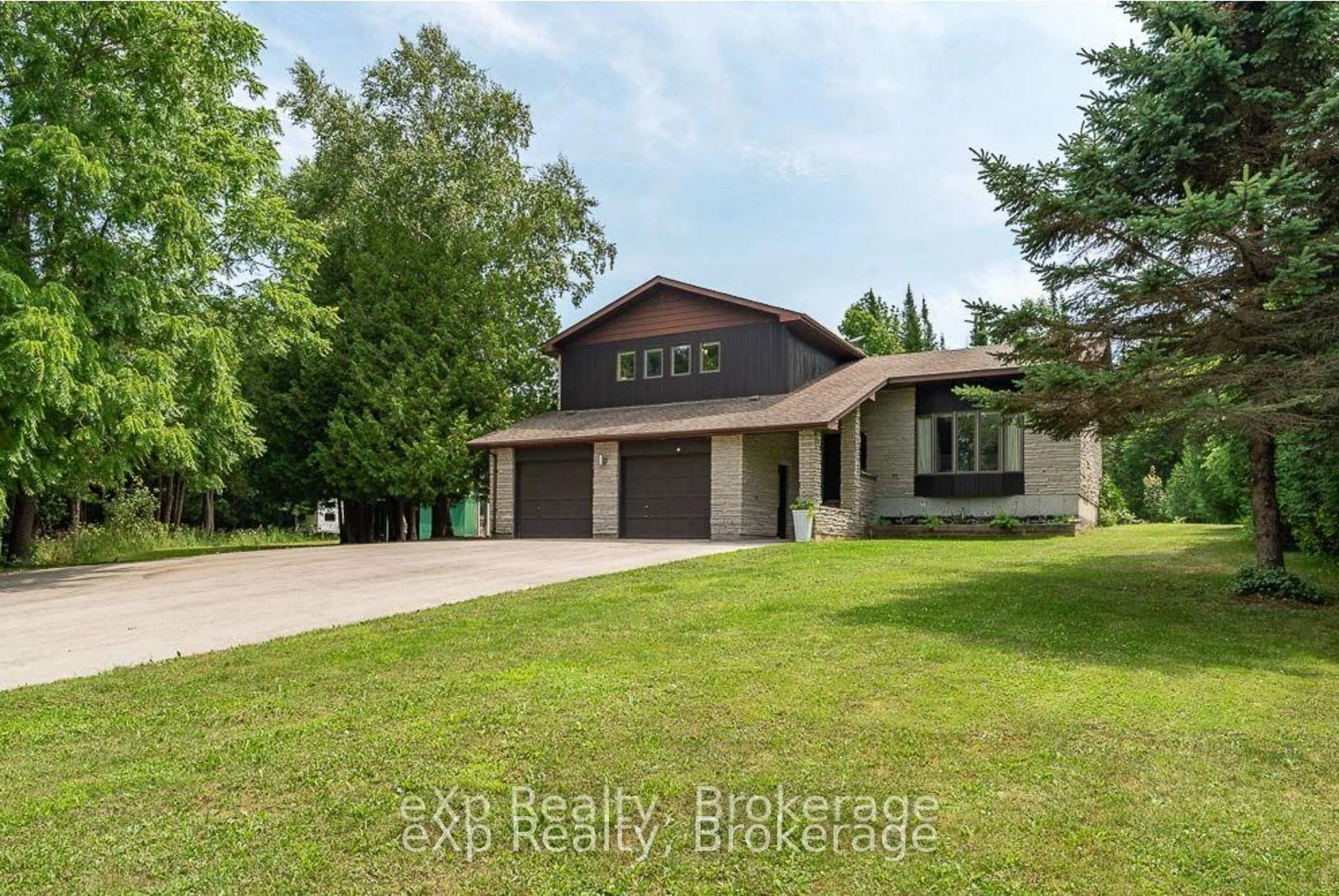 A pic from outside/outdoor area/front of a property/back of a property/a pic from drone, unknown for 502354 Grey Road 1 Rd, Georgian Bluffs Ontario N0H 2T0