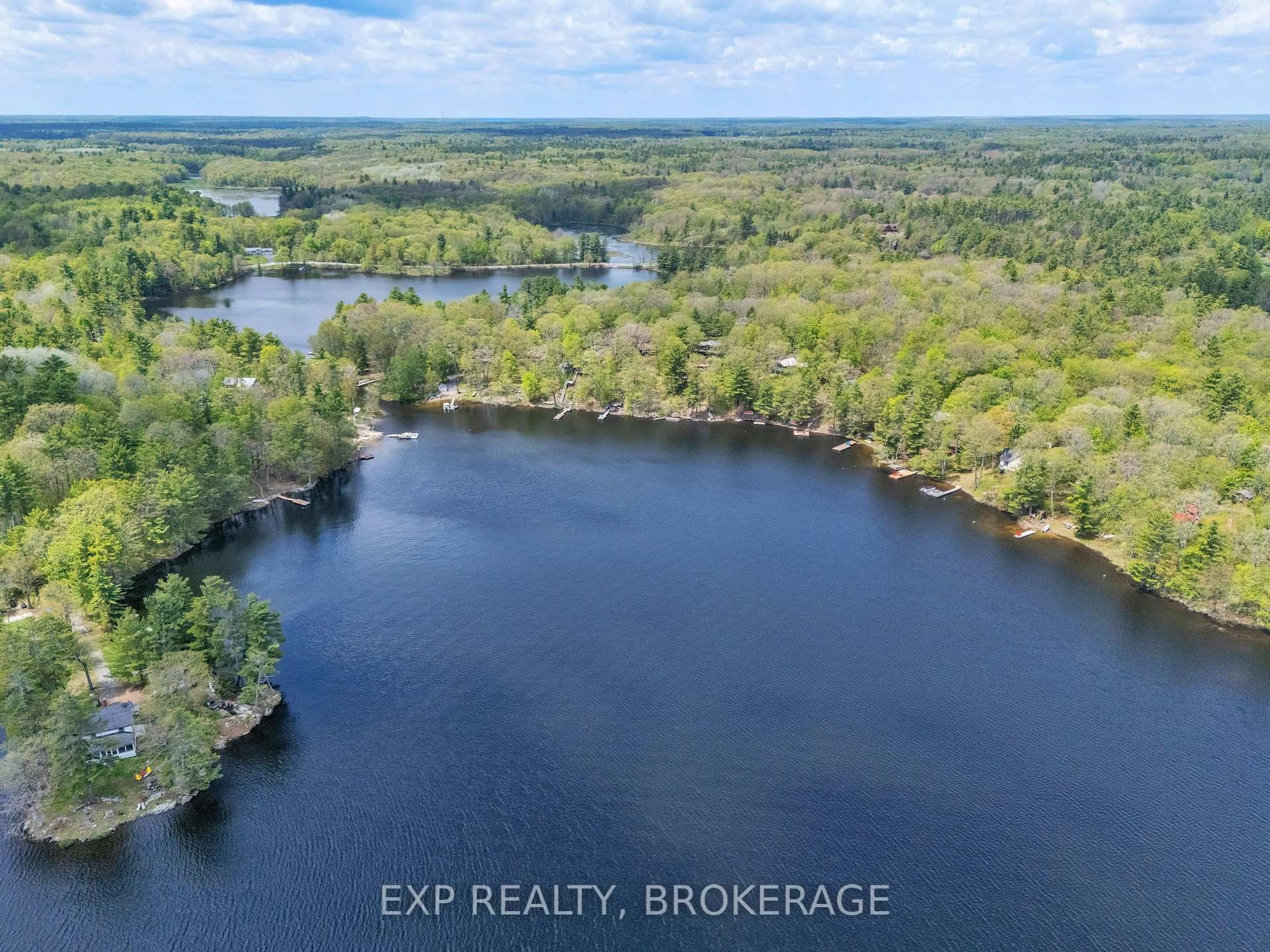 A pic from outside/outdoor area/front of a property/back of a property/a pic from drone, water/lake/river/ocean view for 3 Acorn Lane, Tichborne Ontario K0H 2V0