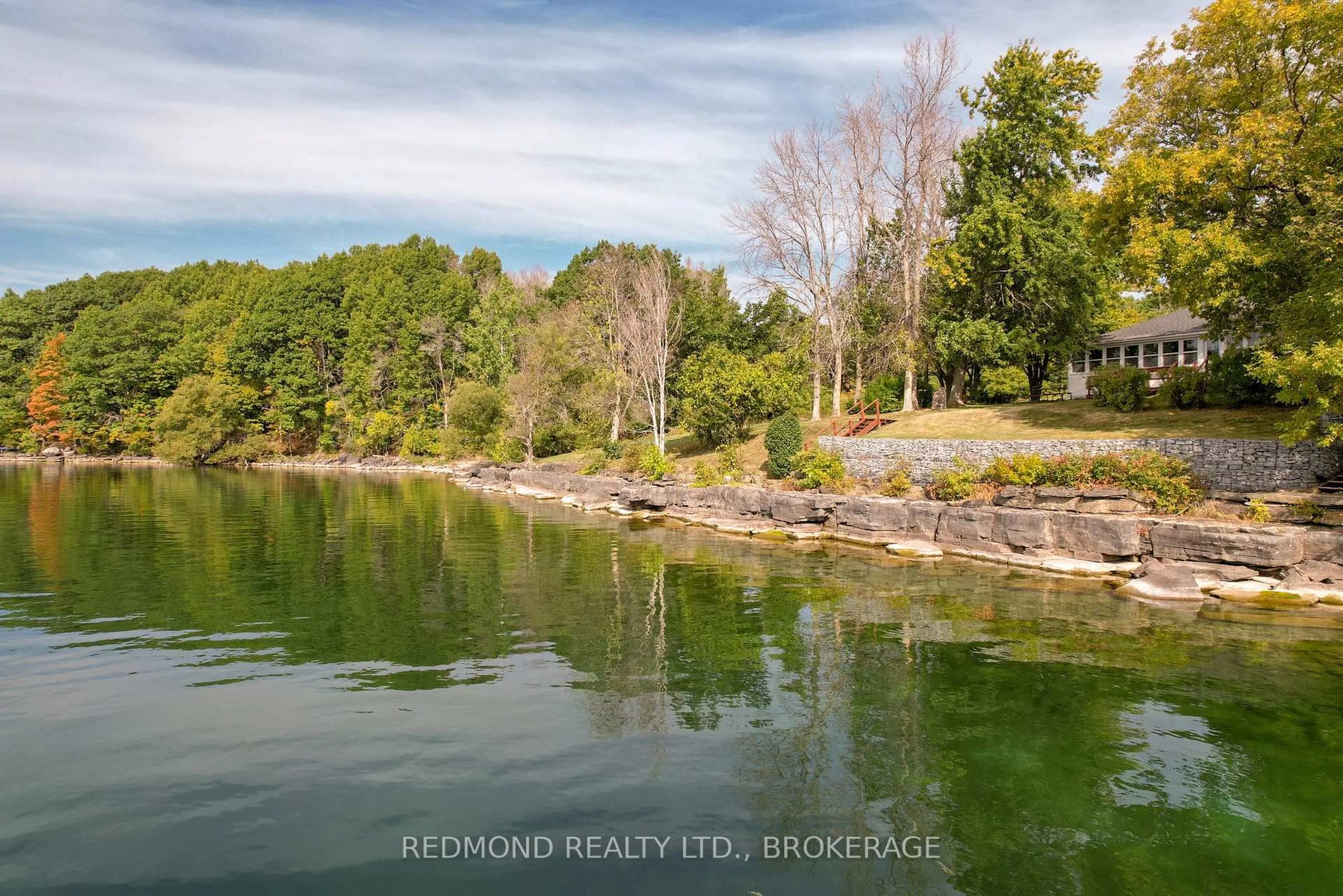 A pic from outside/outdoor area/front of a property/back of a property/a pic from drone, water/lake/river/ocean view for 1686 Howe Island Dr, Gananoque Ontario K7G 2V6